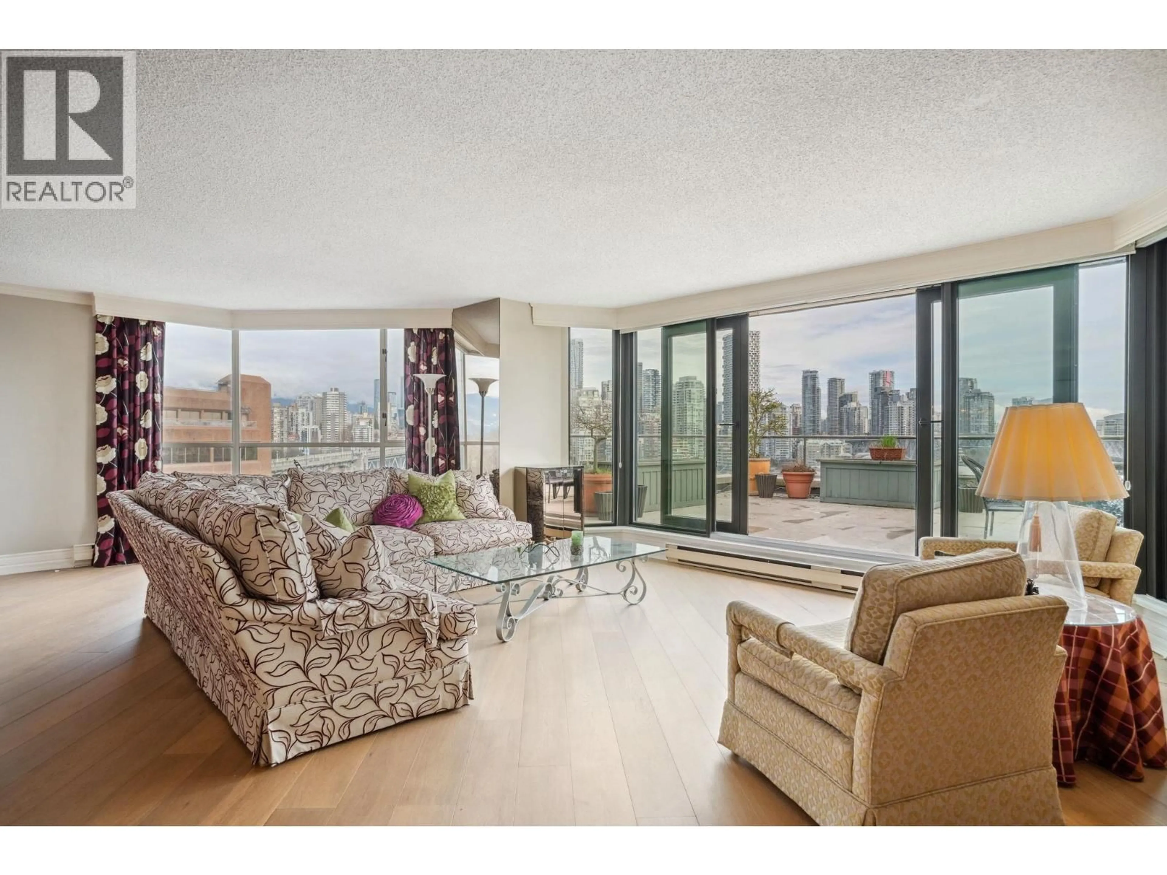 Living room with furniture, unknown for 1009 - 1450 PENNYFARTHING DRIVE, Vancouver British Columbia V6J4X8