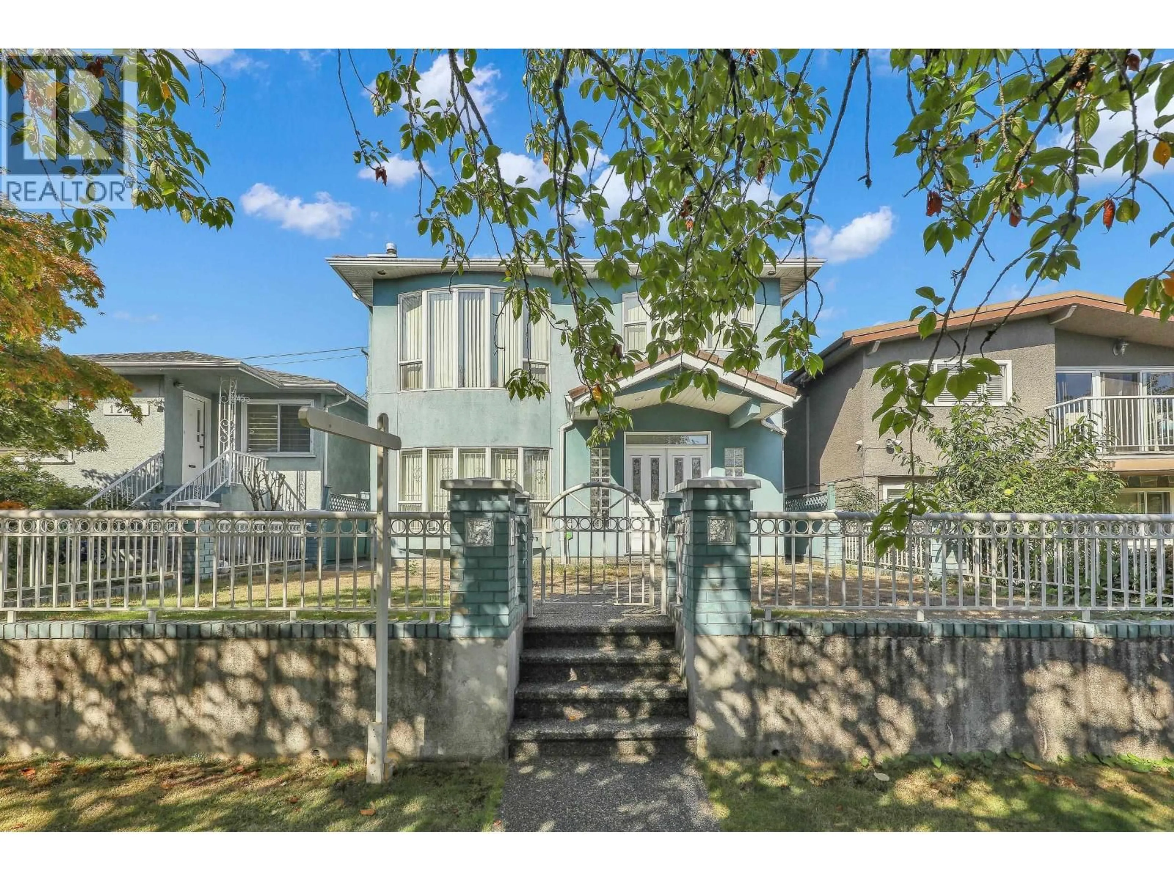 A pic from outside/outdoor area/front of a property/back of a property/a pic from drone, street for 1257 60TH AVENUE, Vancouver British Columbia V5X2A6