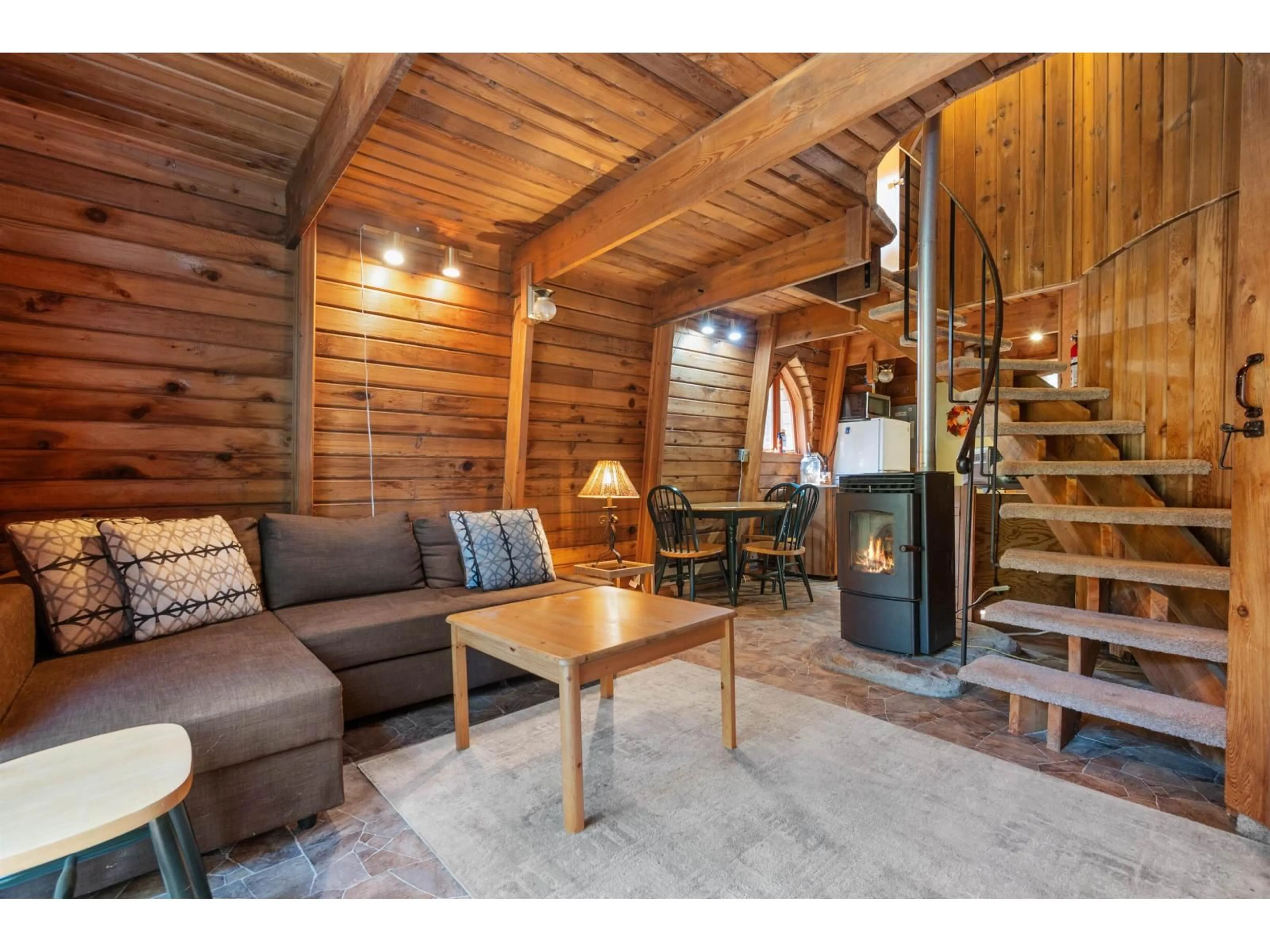 Living room with furniture, wood/laminate floor for 71649 PITCH PLACE, Sunshine Valley British Columbia V0X1L5