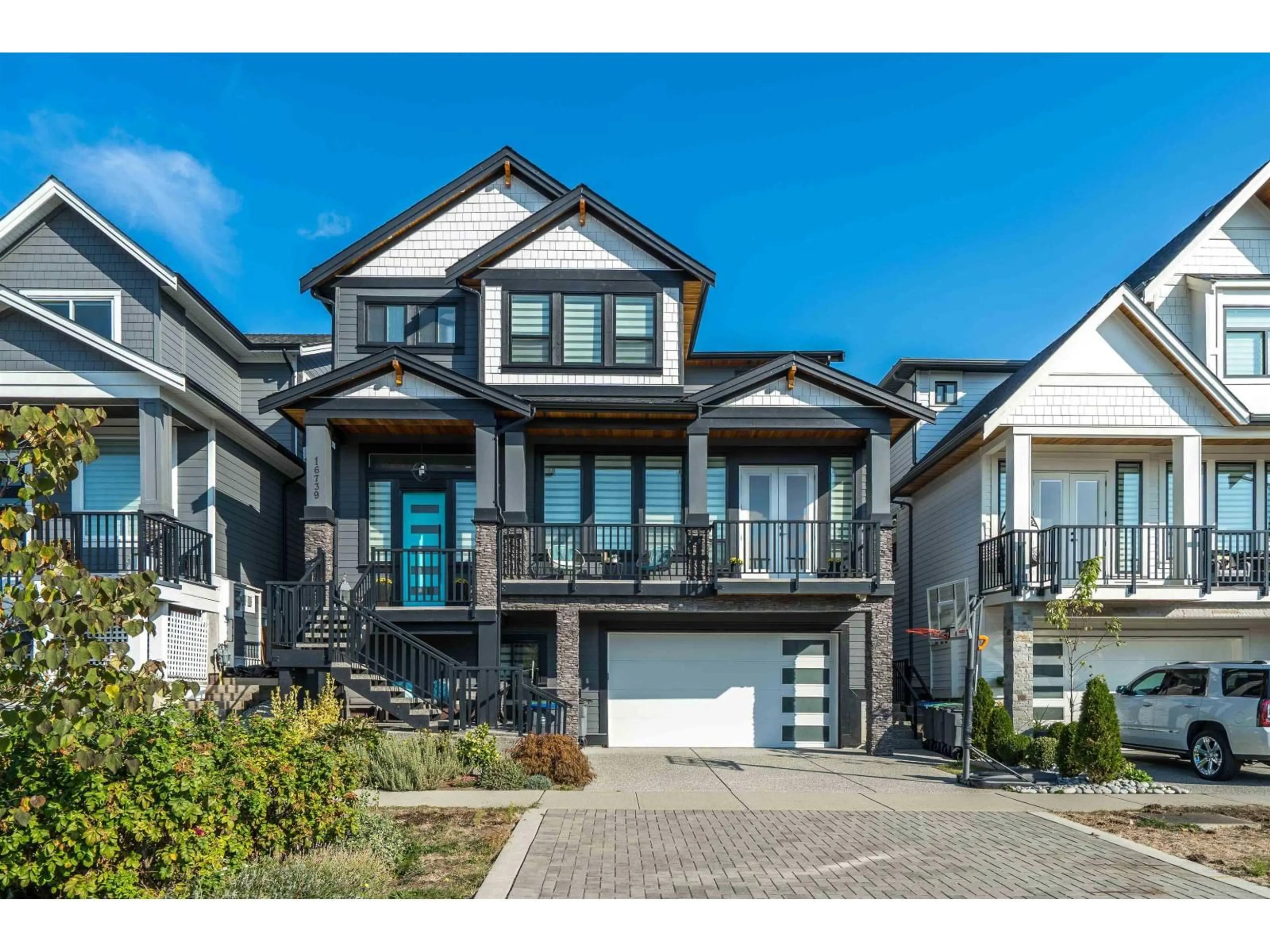 Home with vinyl exterior material, street for 16739 16A, Surrey British Columbia V3Z0T3