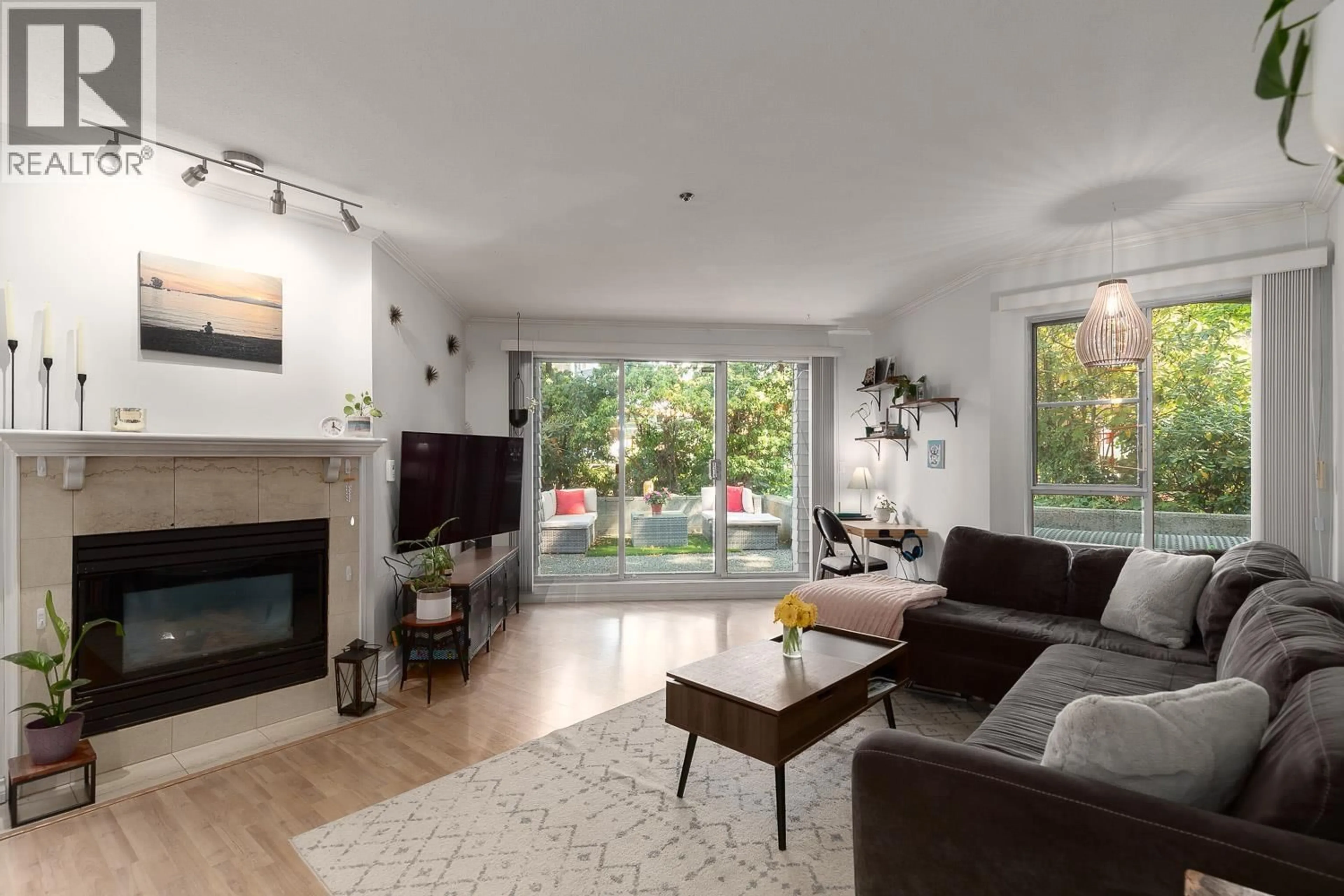 Living room with furniture, wood/laminate floor for 102 - 838 16TH AVENUE, Vancouver British Columbia V5Z1T1