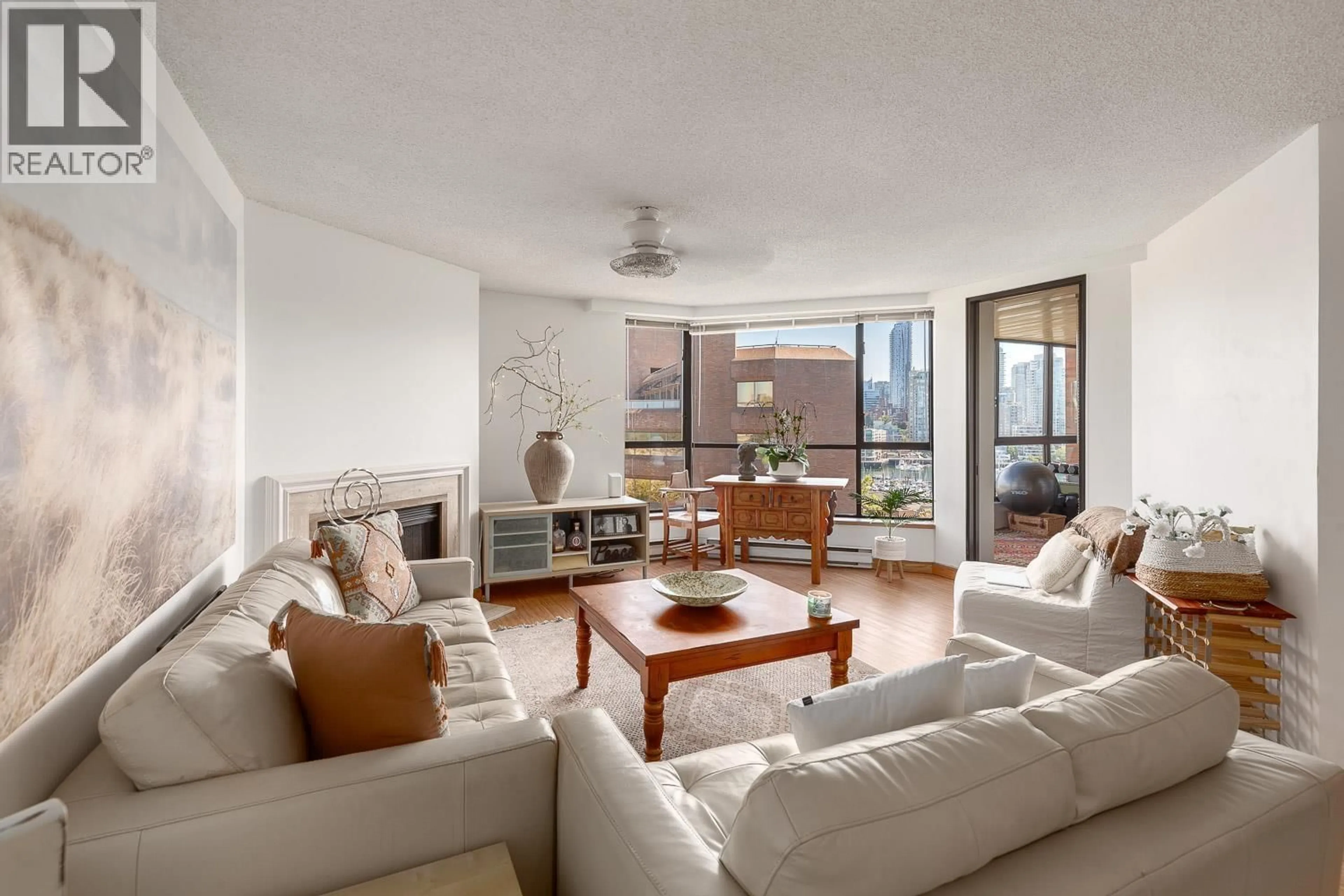 Living room with furniture, unknown for 1003 - 1450 PENNYFARTHING DRIVE, Vancouver British Columbia V6J4X8