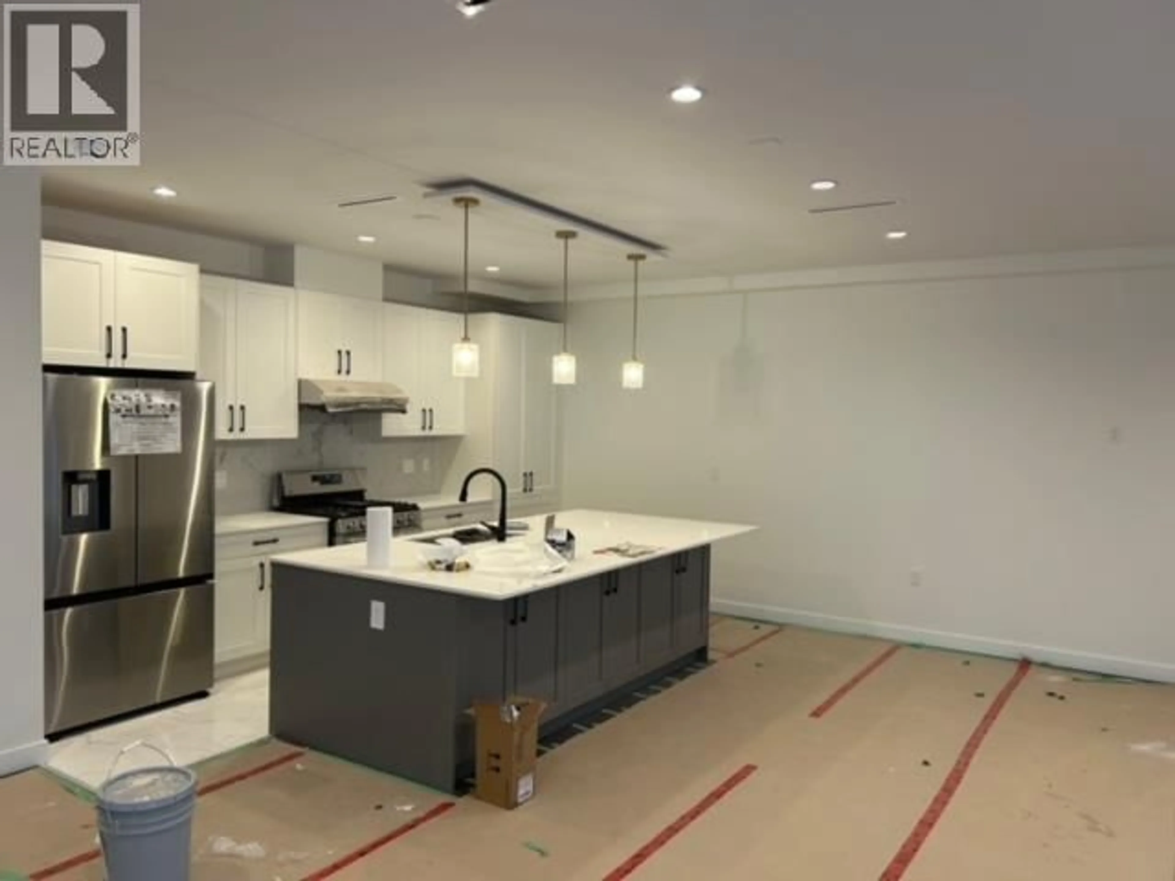 Open concept kitchen, ceramic/tile floor for 5623 WOODSWORTH STREET, Burnaby British Columbia V5G3P6