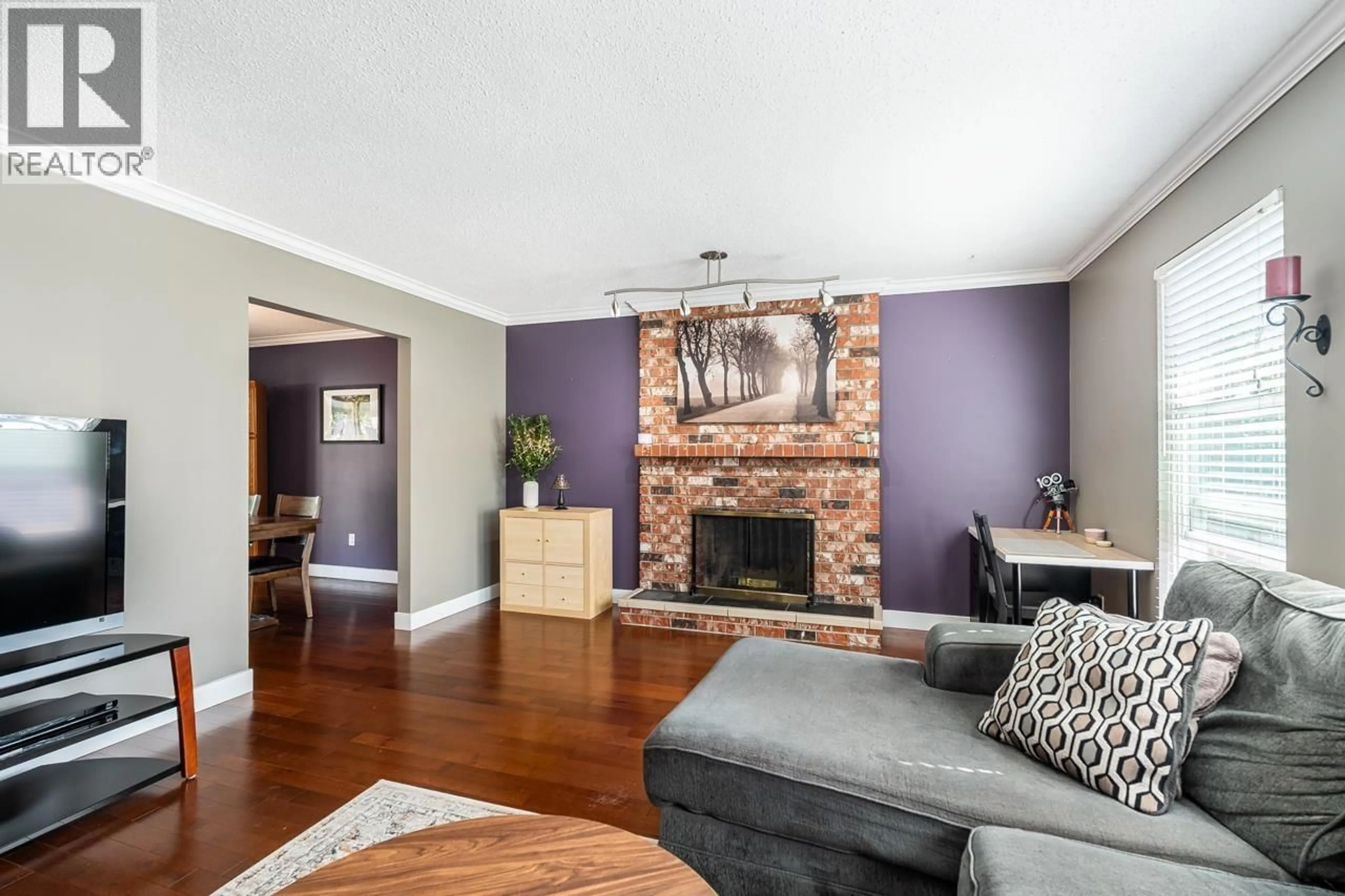 Living room with furniture, wood/laminate floor for 2507 BATTISTONI PLACE, Port Coquitlam British Columbia V3B5W1
