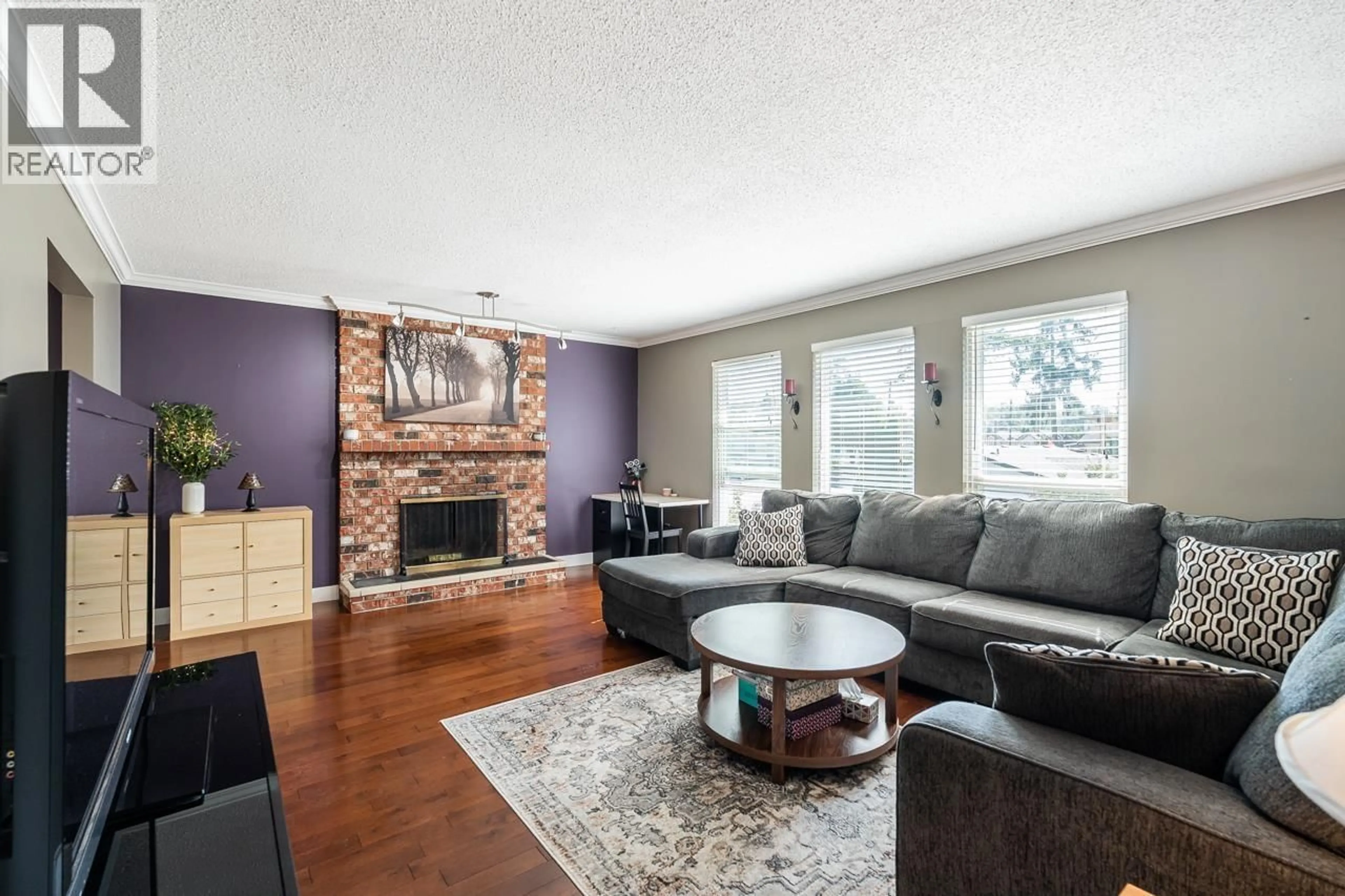 Living room with furniture, wood/laminate floor for 2507 BATTISTONI PLACE, Port Coquitlam British Columbia V3B5W1
