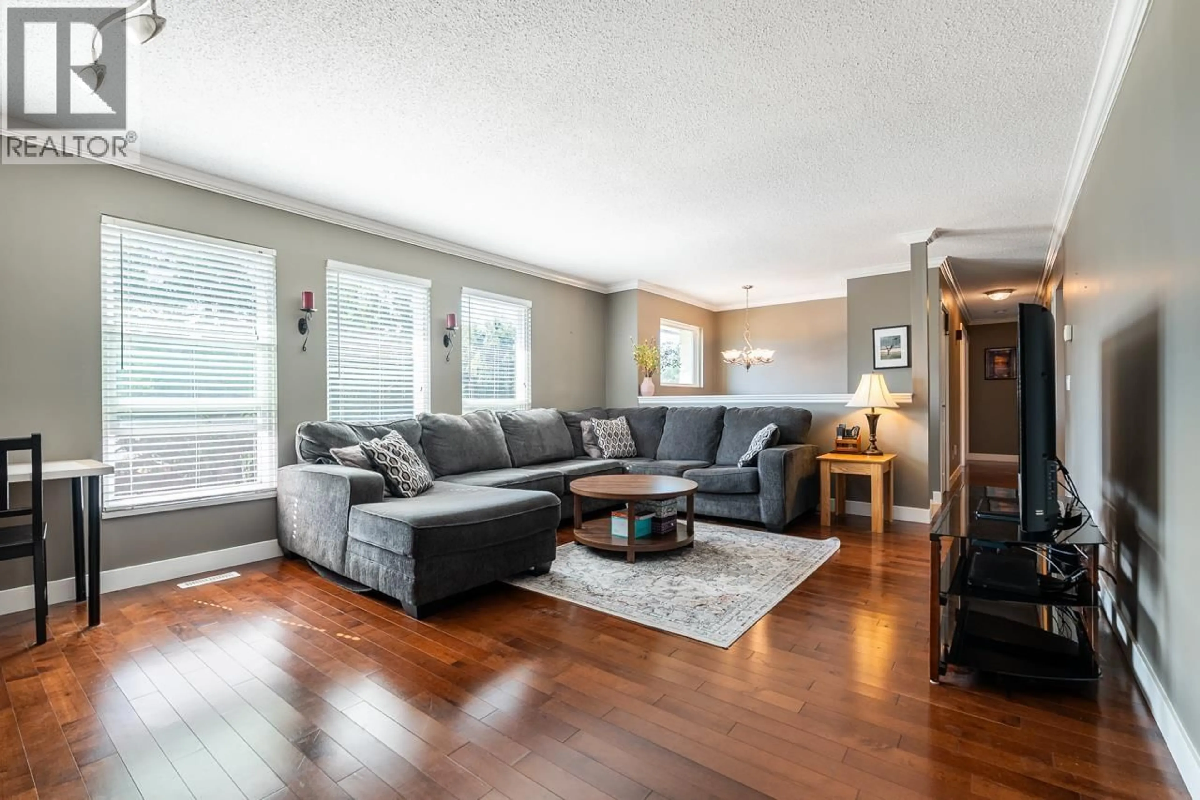 Living room with furniture, wood/laminate floor for 2507 BATTISTONI PLACE, Port Coquitlam British Columbia V3B5W1