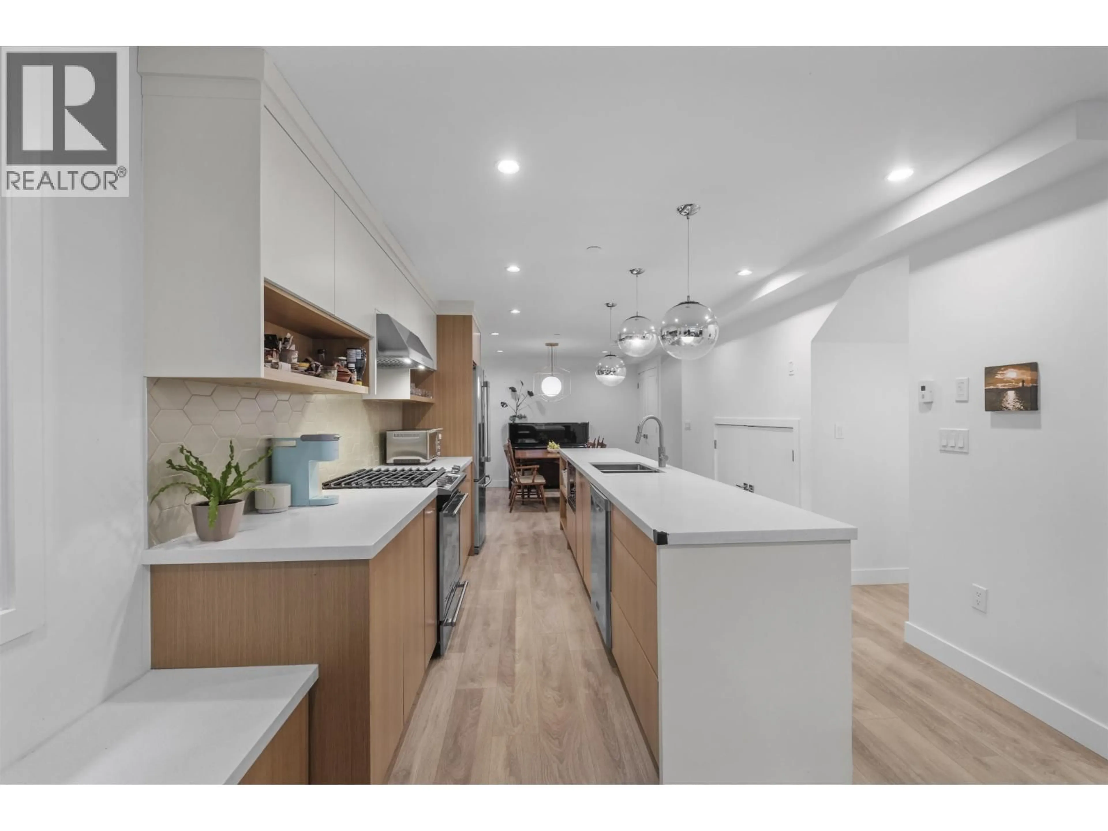Open concept kitchen, wood/laminate floor for 1452 20TH AVENUE, Vancouver British Columbia V5N2K6