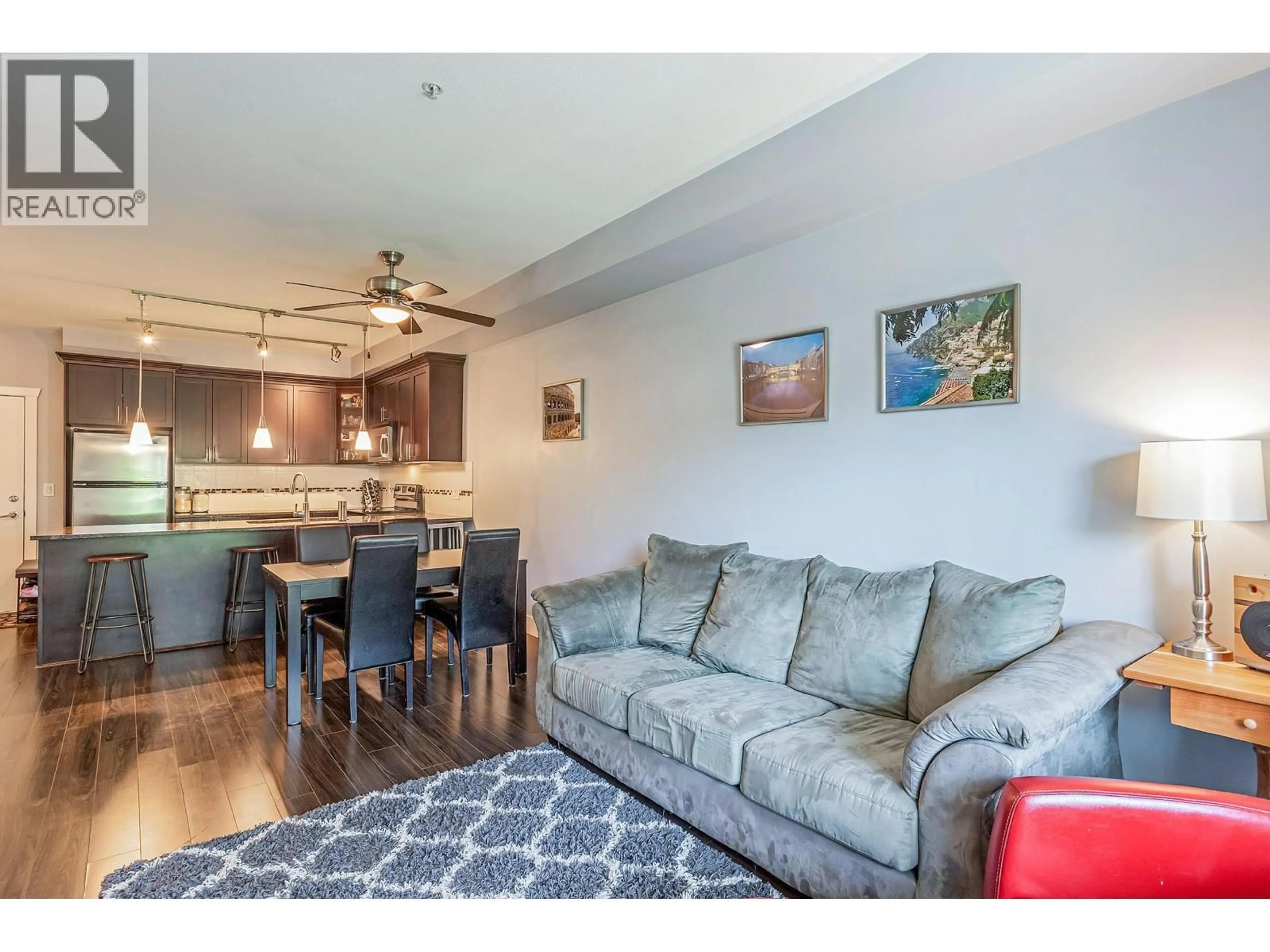 Living room with furniture, wood/laminate floor for 309 - 2330 SHAUGHNESSY STREET, Port Coquitlam British Columbia V5C0B5