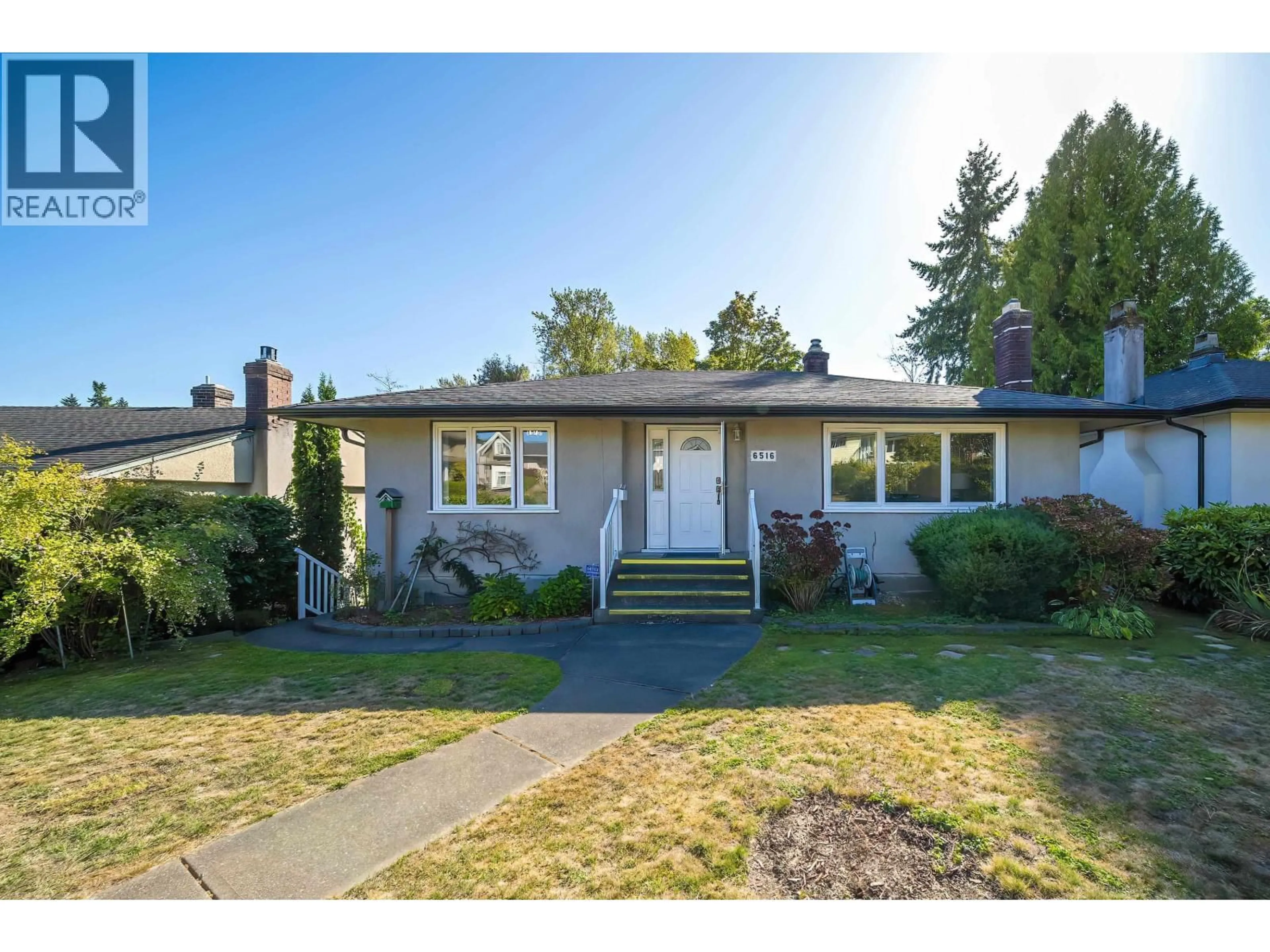 Home with vinyl exterior material, street for 6516 PORTLAND STREET, Burnaby British Columbia V5E1A2