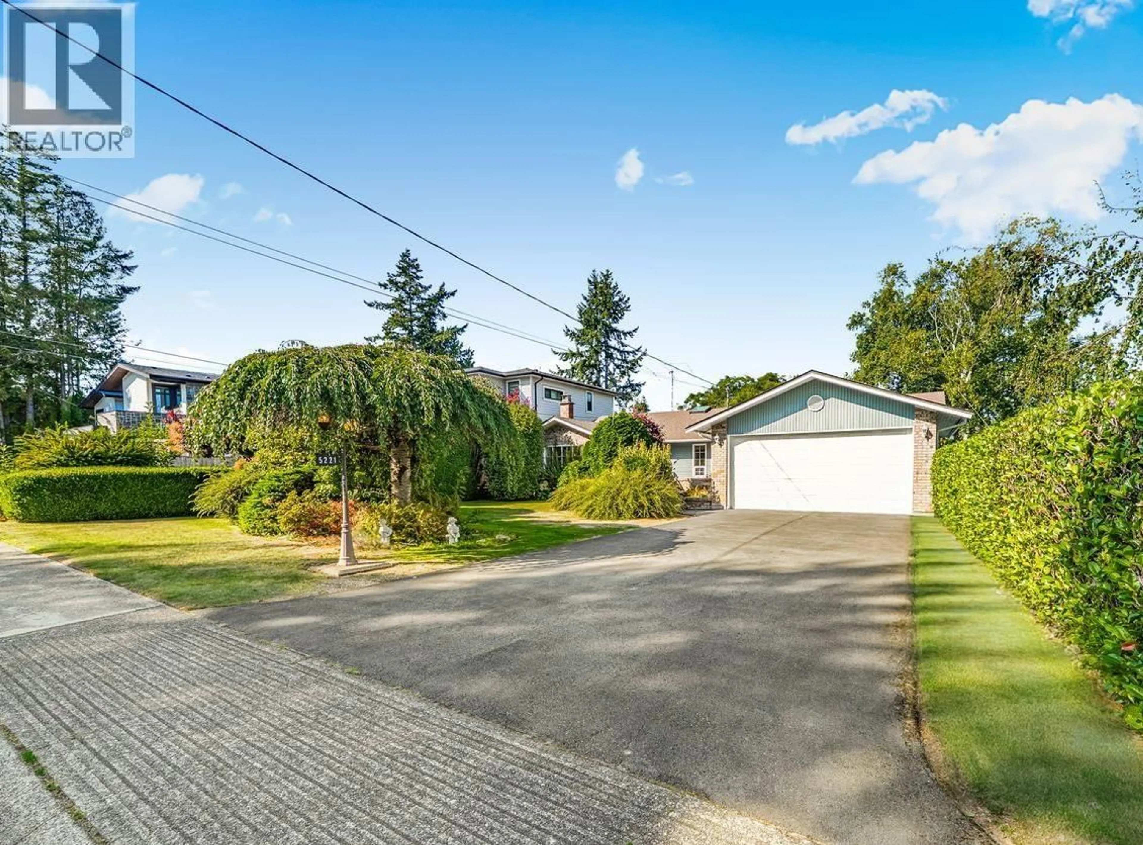 A pic from outside/outdoor area/front of a property/back of a property/a pic from drone, street for 5221 1 AVENUE, Delta British Columbia V4M1B4