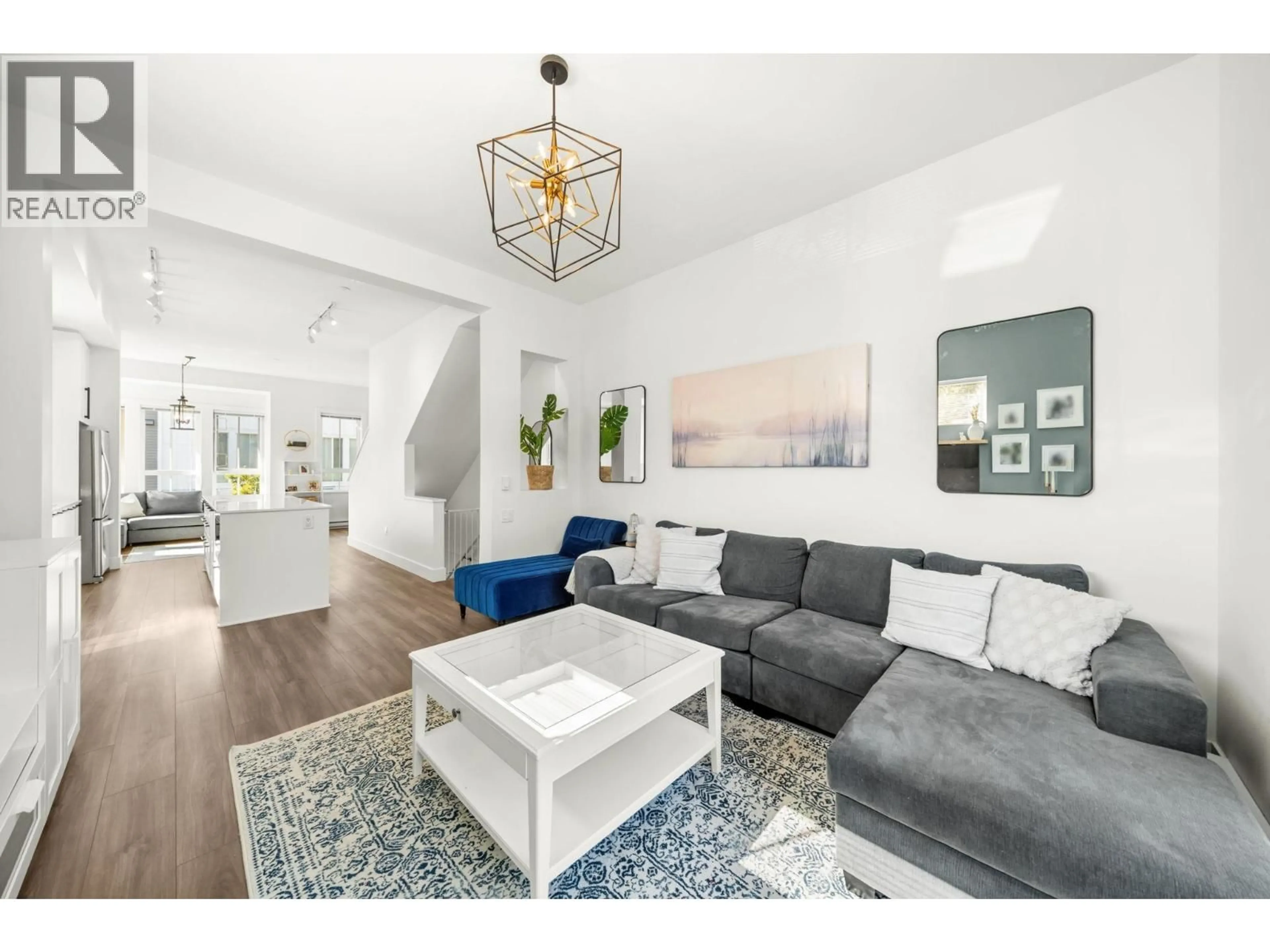 Living room with furniture, wood/laminate floor for 39 - 4656 ORCA WAY, Tsawwassen British Columbia V4M0C9