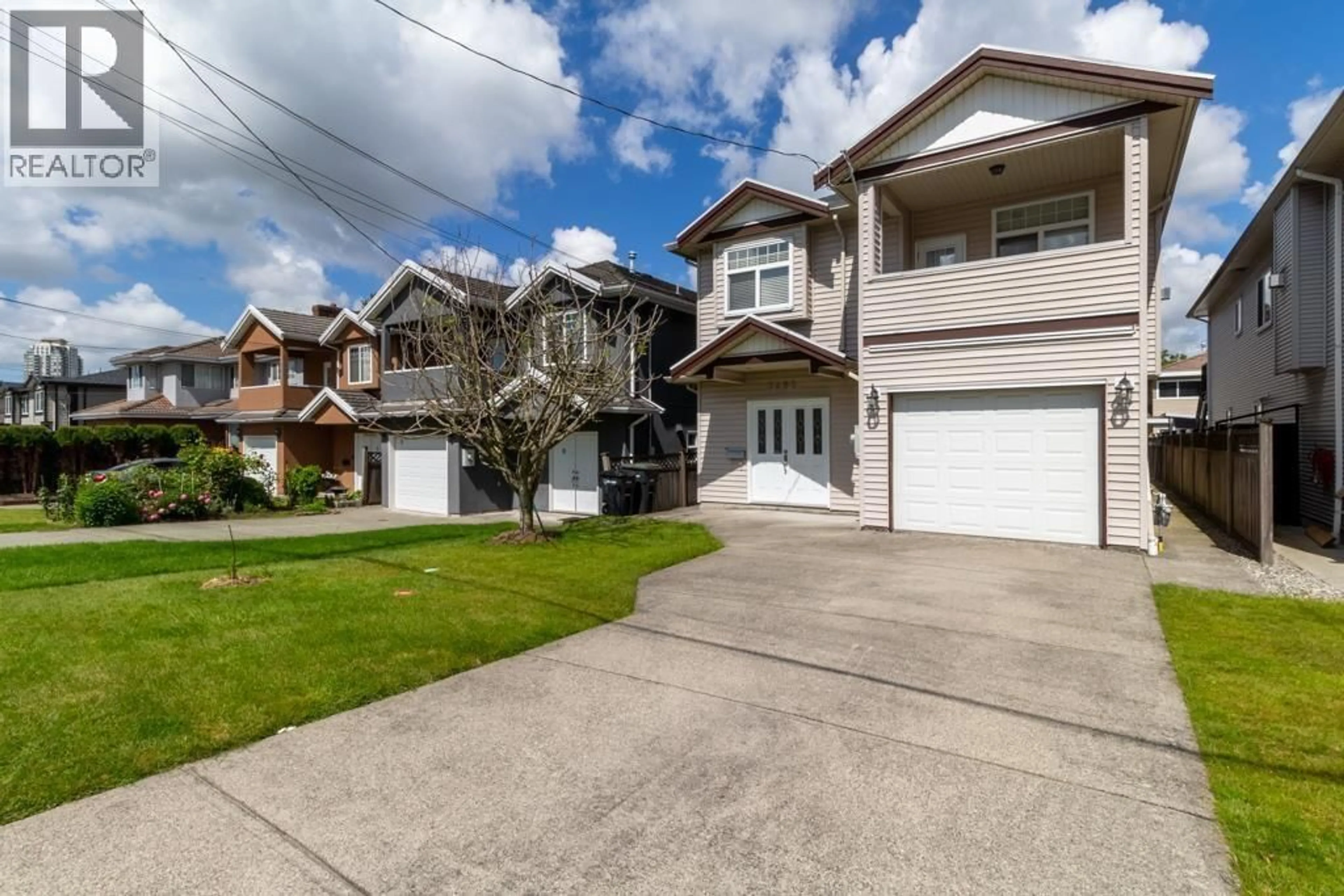 Home with vinyl exterior material, street for 7487 ROSEWOOD STREET, Burnaby British Columbia V5E2G6