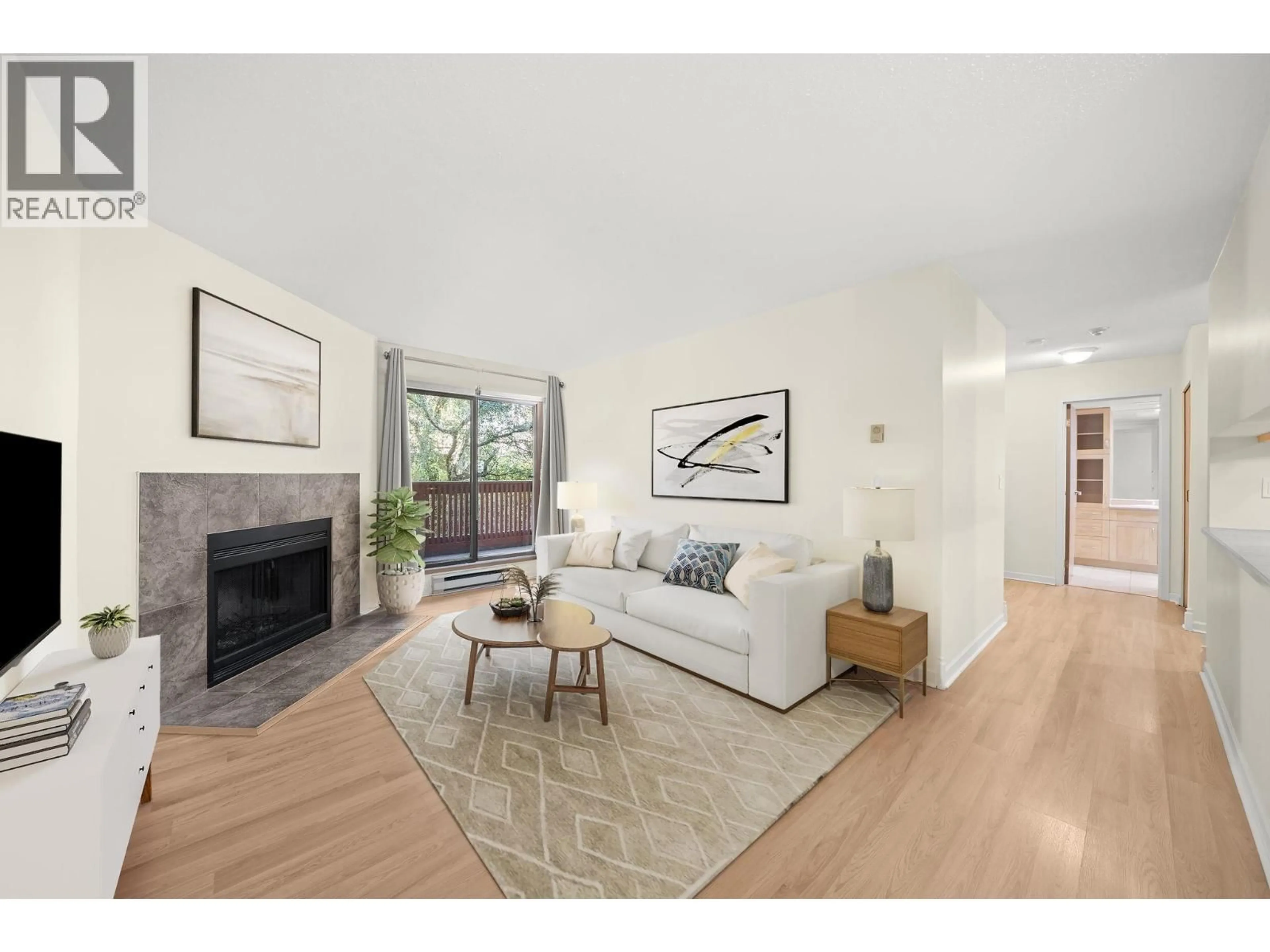 Living room with furniture, wood/laminate floor for 115 - 7531 MINORU BOULEVARD, Richmond British Columbia V6Y1Z3