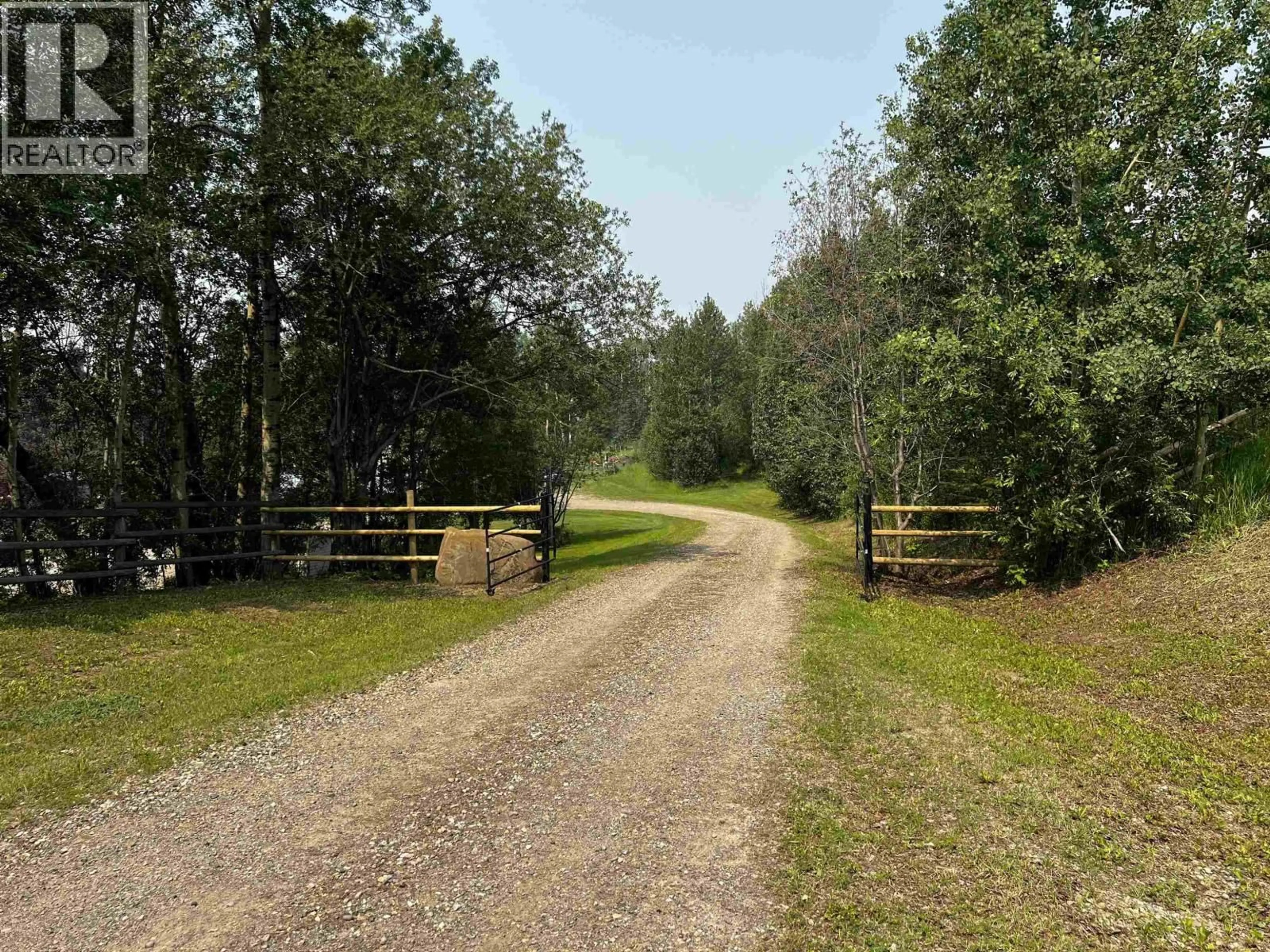 A pic from outside/outdoor area/front of a property/back of a property/a pic from drone, forest/trees view for 13480 CANARY ROAD, Charlie Lake British Columbia V0C1H0