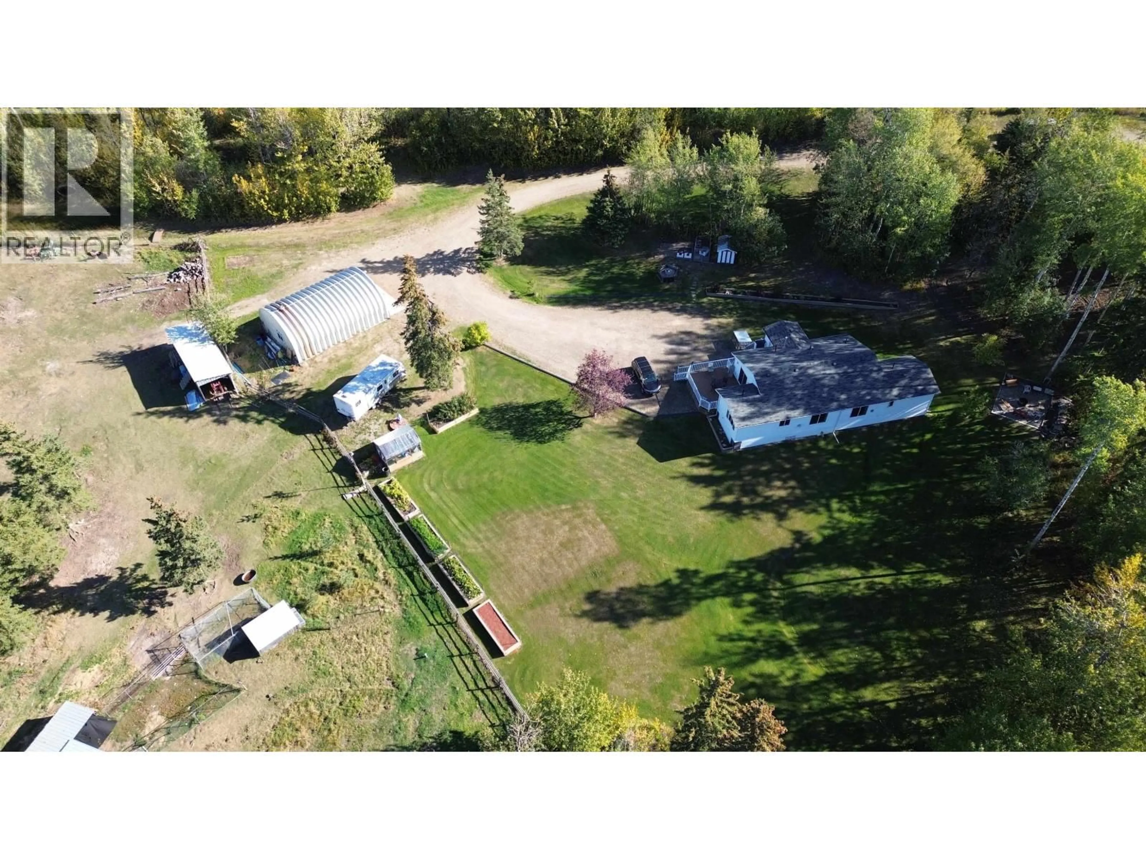 A pic from outside/outdoor area/front of a property/back of a property/a pic from drone, unknown for 13480 CANARY ROAD, Charlie Lake British Columbia V0C1H0