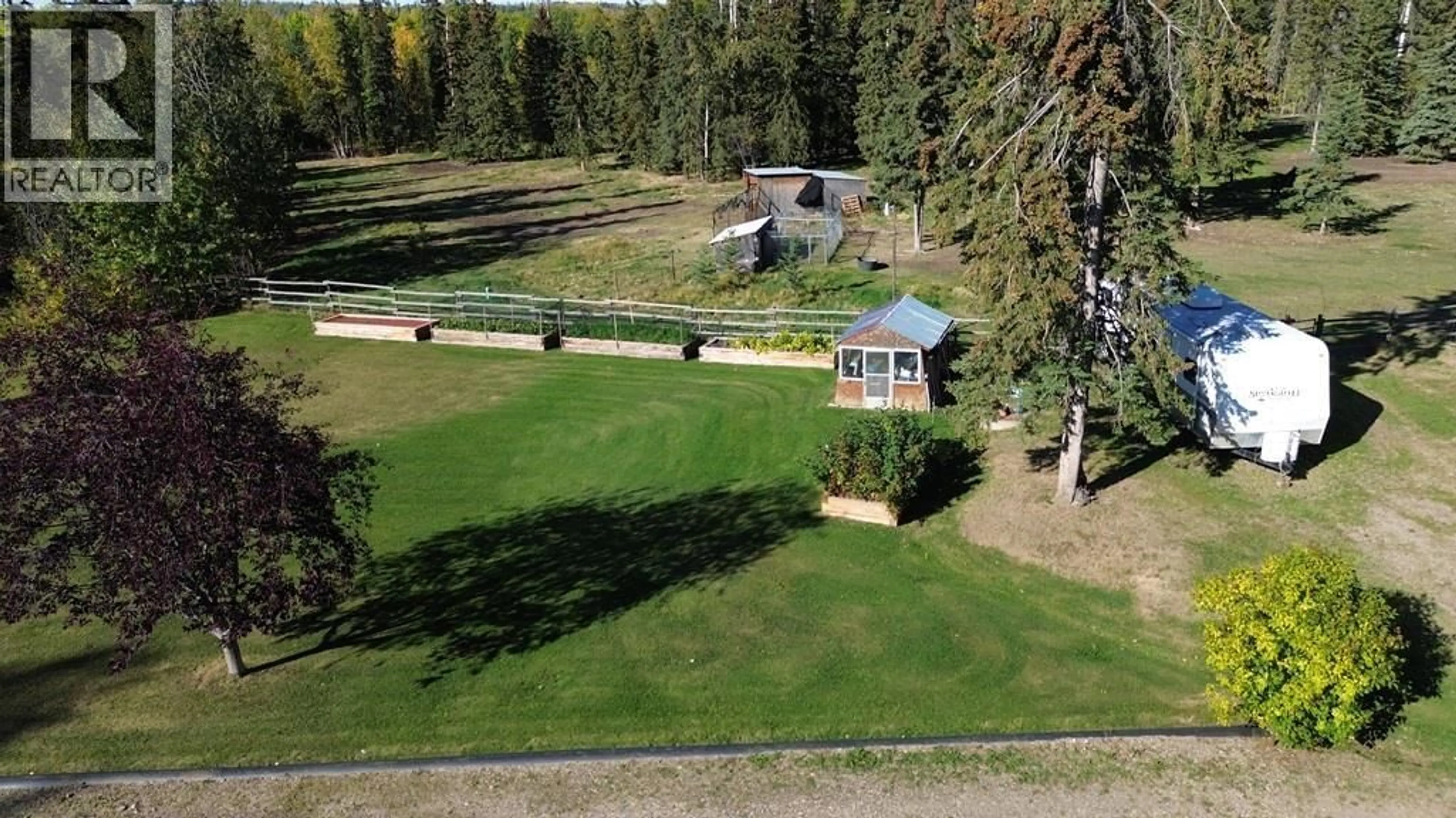 A pic from outside/outdoor area/front of a property/back of a property/a pic from drone, unknown for 13480 CANARY ROAD, Charlie Lake British Columbia V0C1H0