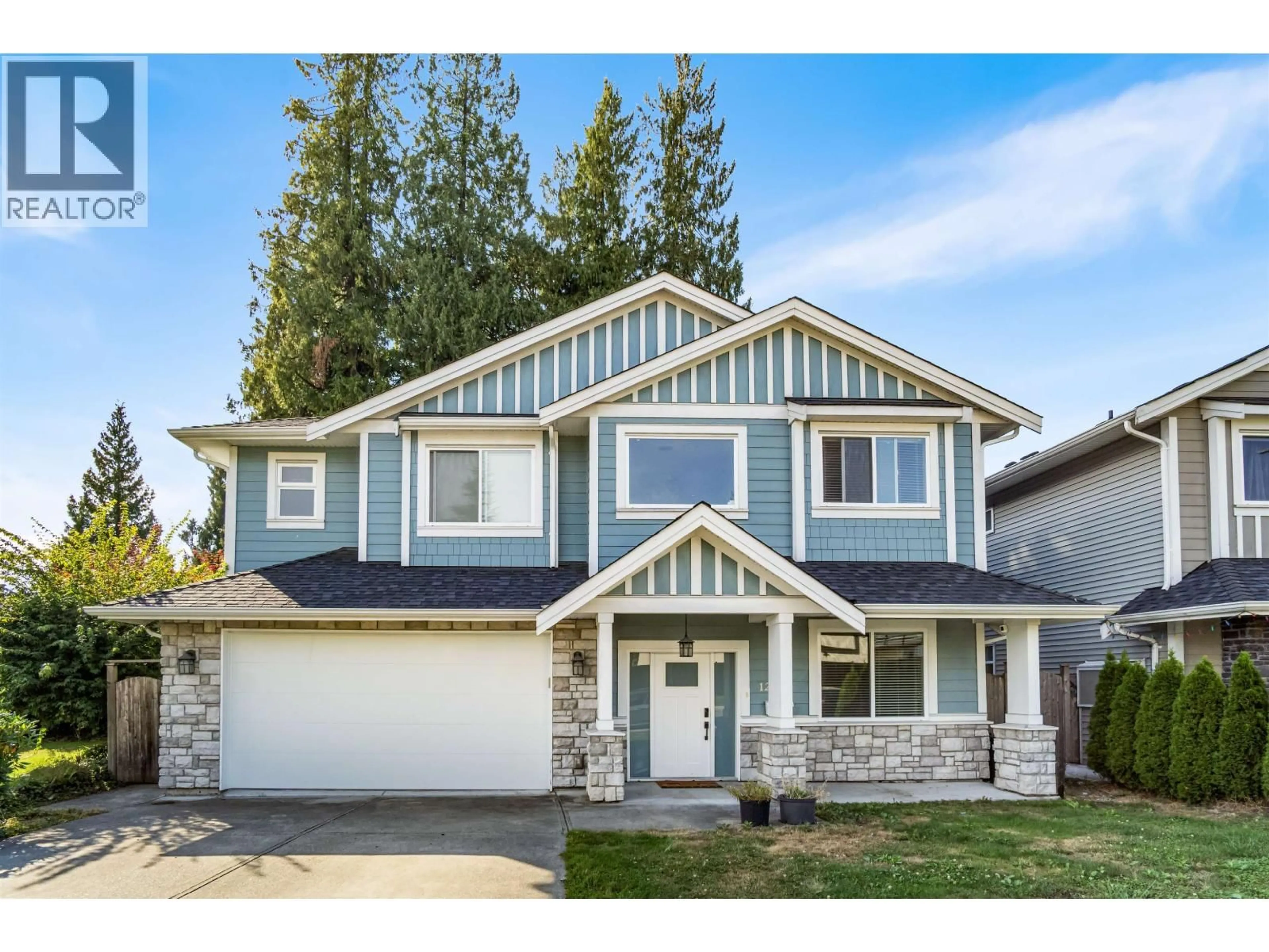 Home with vinyl exterior material, street for 12265 210 STREET, Maple Ridge British Columbia V2X8B9