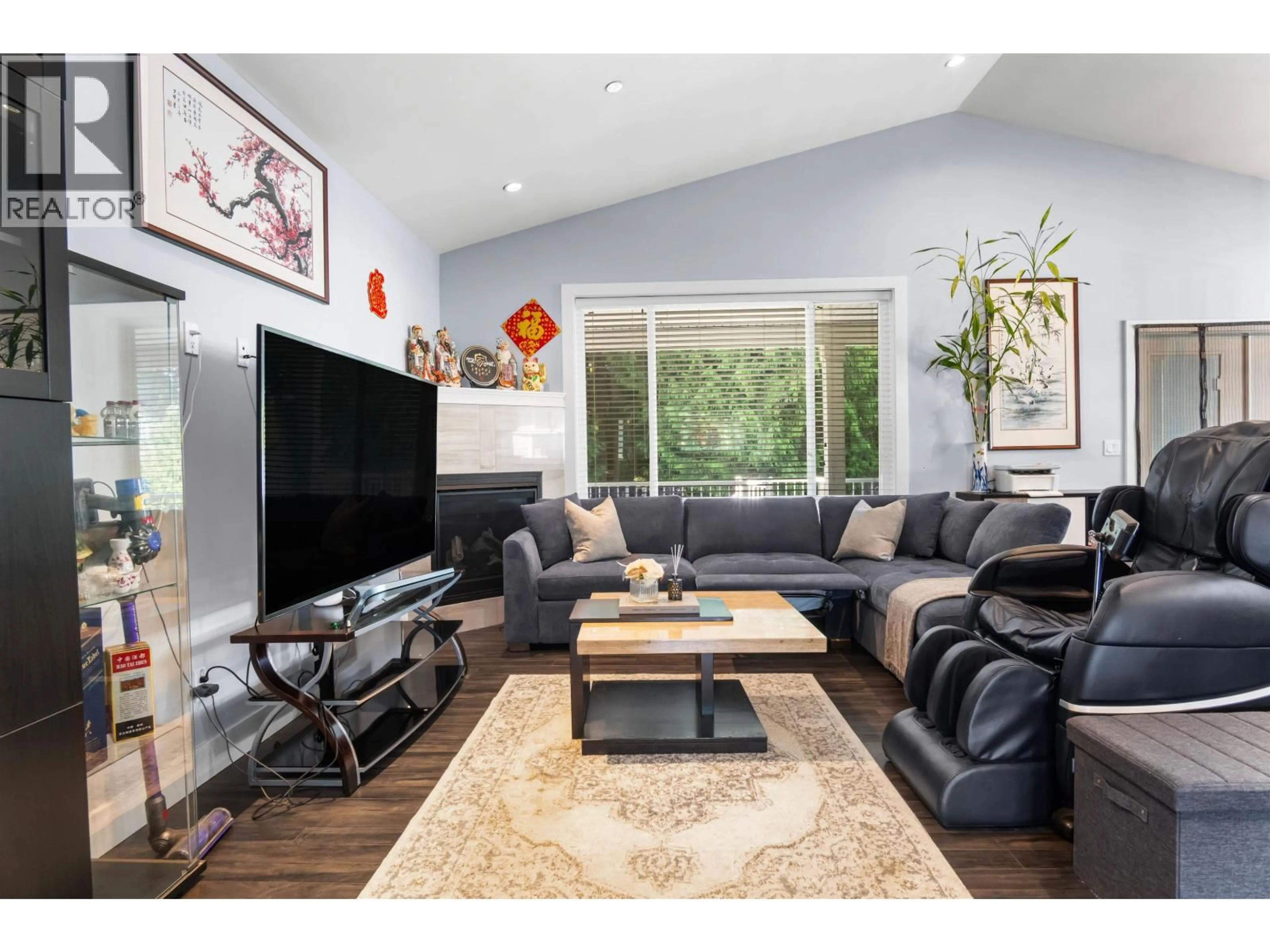 Living room with furniture, wood/laminate floor for 12265 210 STREET, Maple Ridge British Columbia V2X8B9