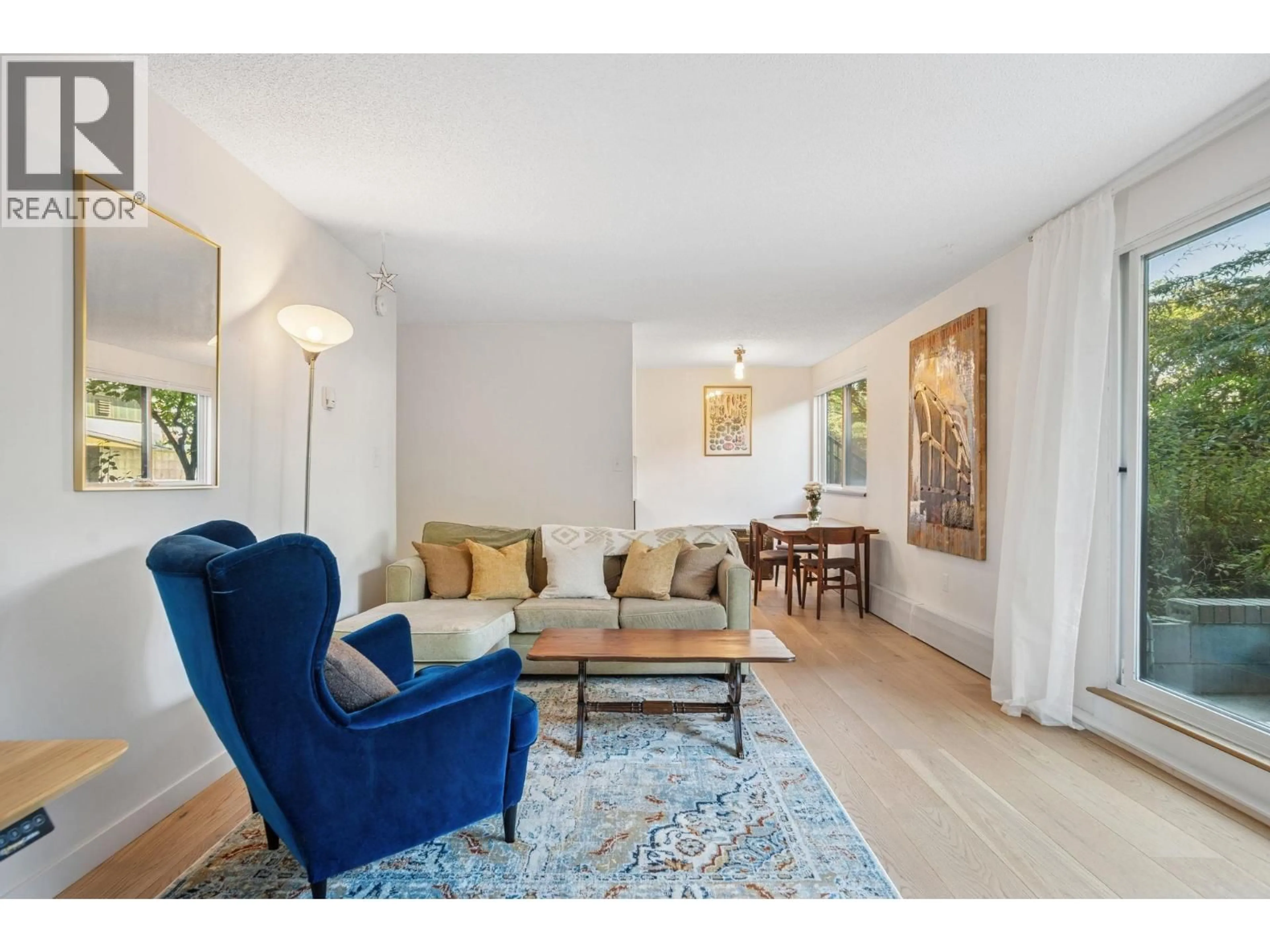 Living room with furniture, unknown for 113 - 2033 TRIUMPH STREET, Vancouver British Columbia V5L4X3