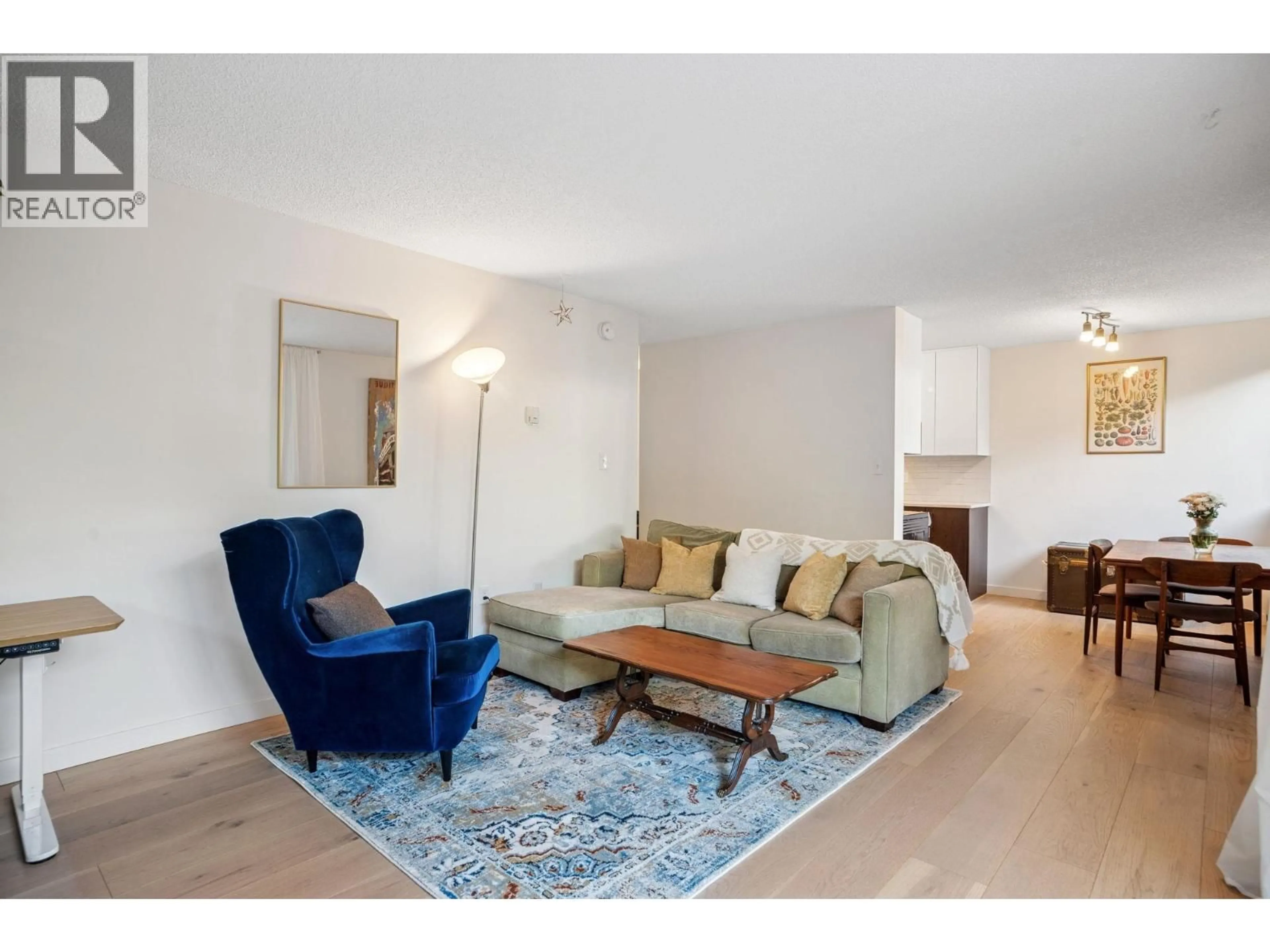 Living room with furniture, unknown for 113 - 2033 TRIUMPH STREET, Vancouver British Columbia V5L4X3