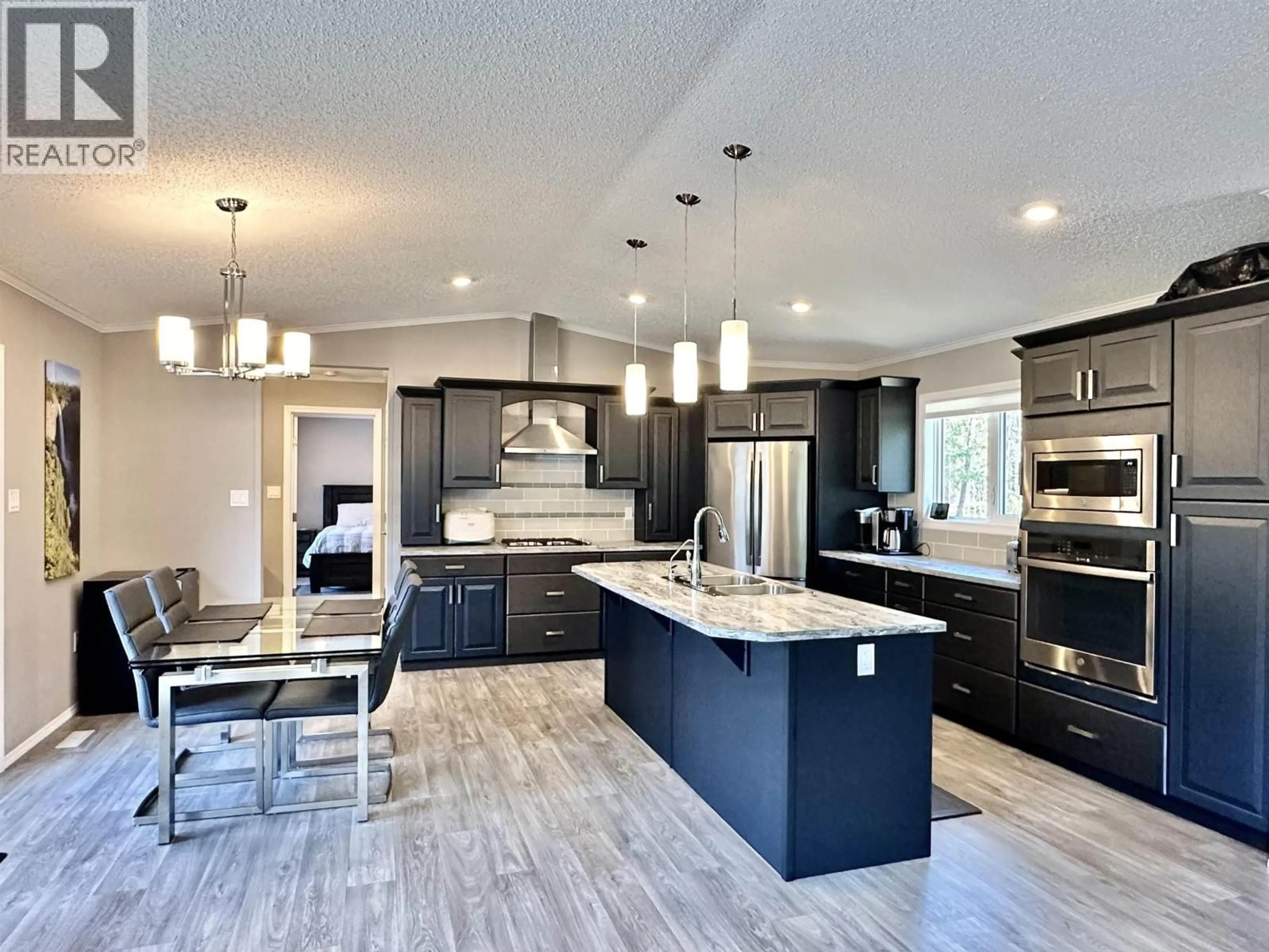 Open concept kitchen, unknown for 11975 BLACKMAN ROAD, Valemount British Columbia V0E2Z0