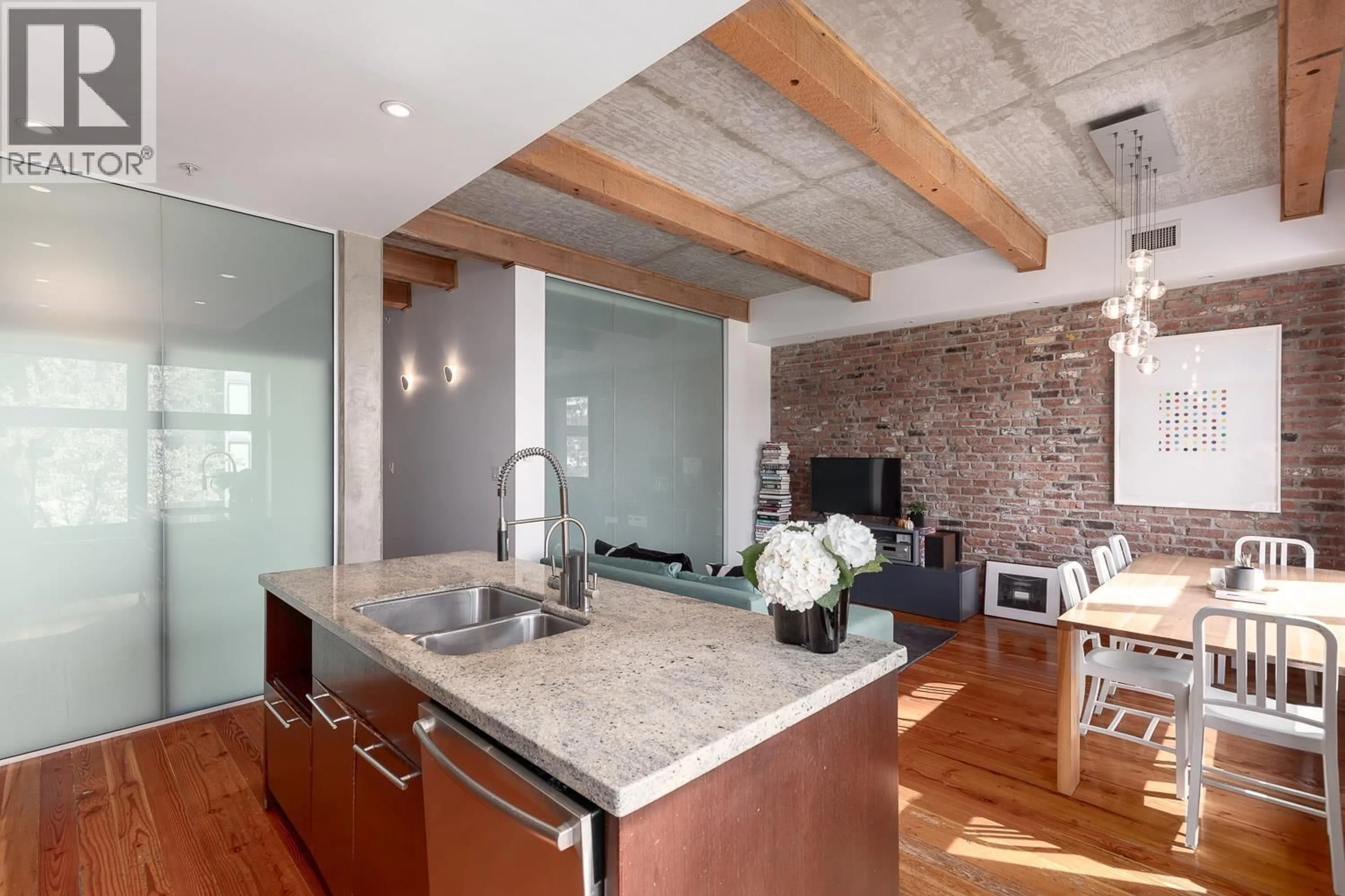 Open concept kitchen, cement floor for 501 - 1180 HOMER STREET, Vancouver British Columbia V6B2X6