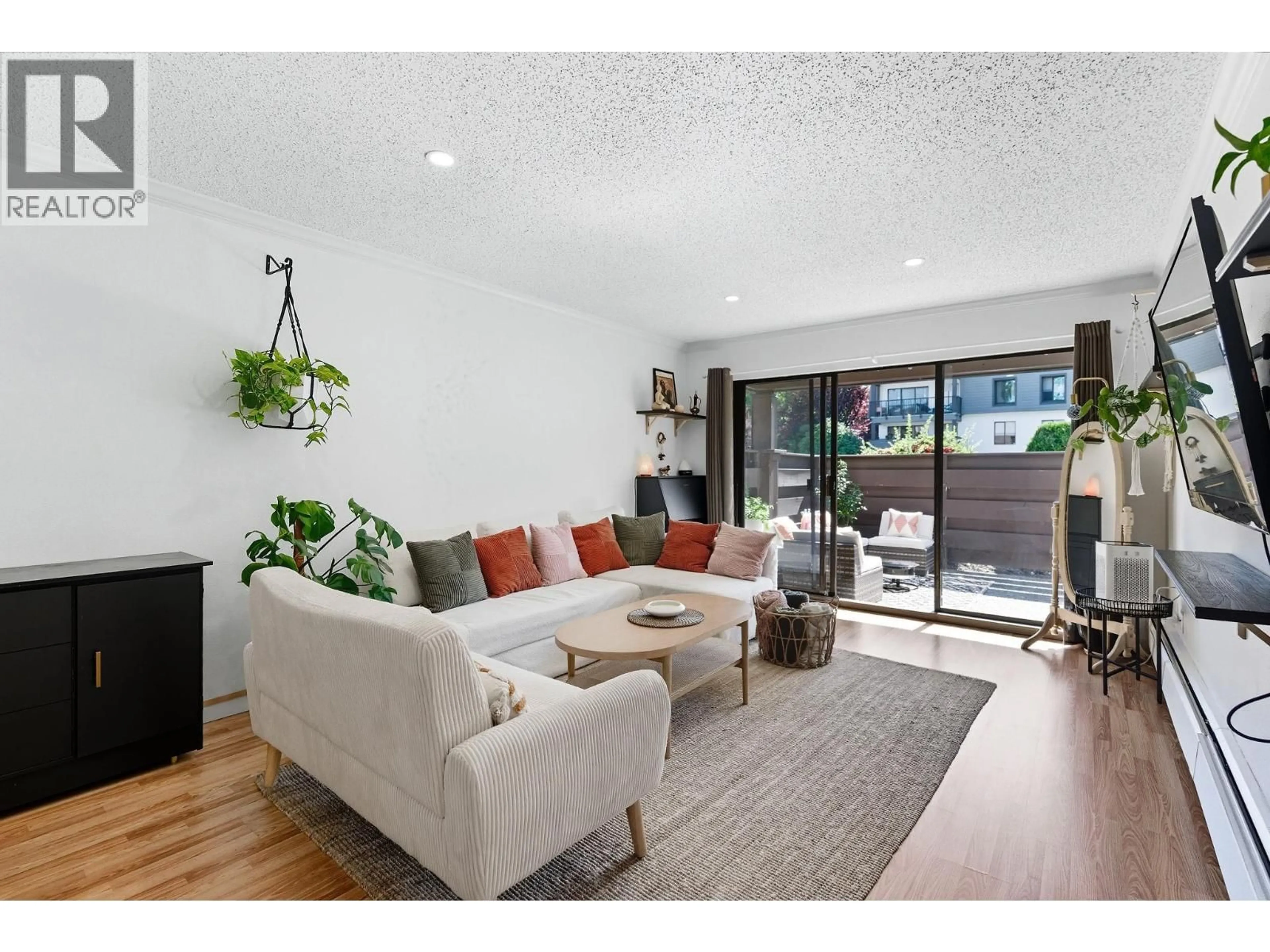 Living room with furniture, unknown for 102 - 8820 NO. 1 ROAD, Richmond British Columbia V7C4C1