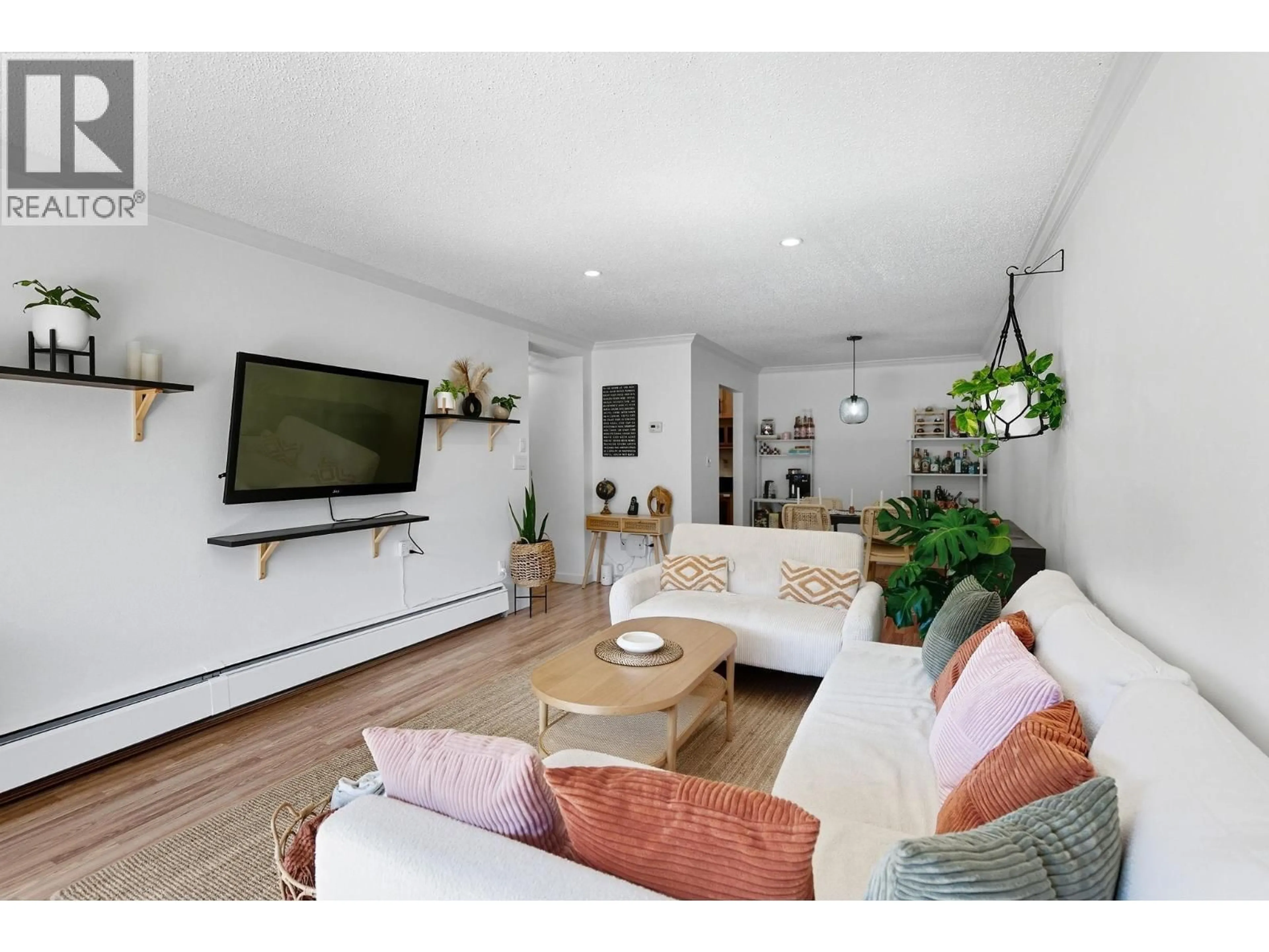 Living room with furniture, unknown for 102 - 8820 NO. 1 ROAD, Richmond British Columbia V7C4C1