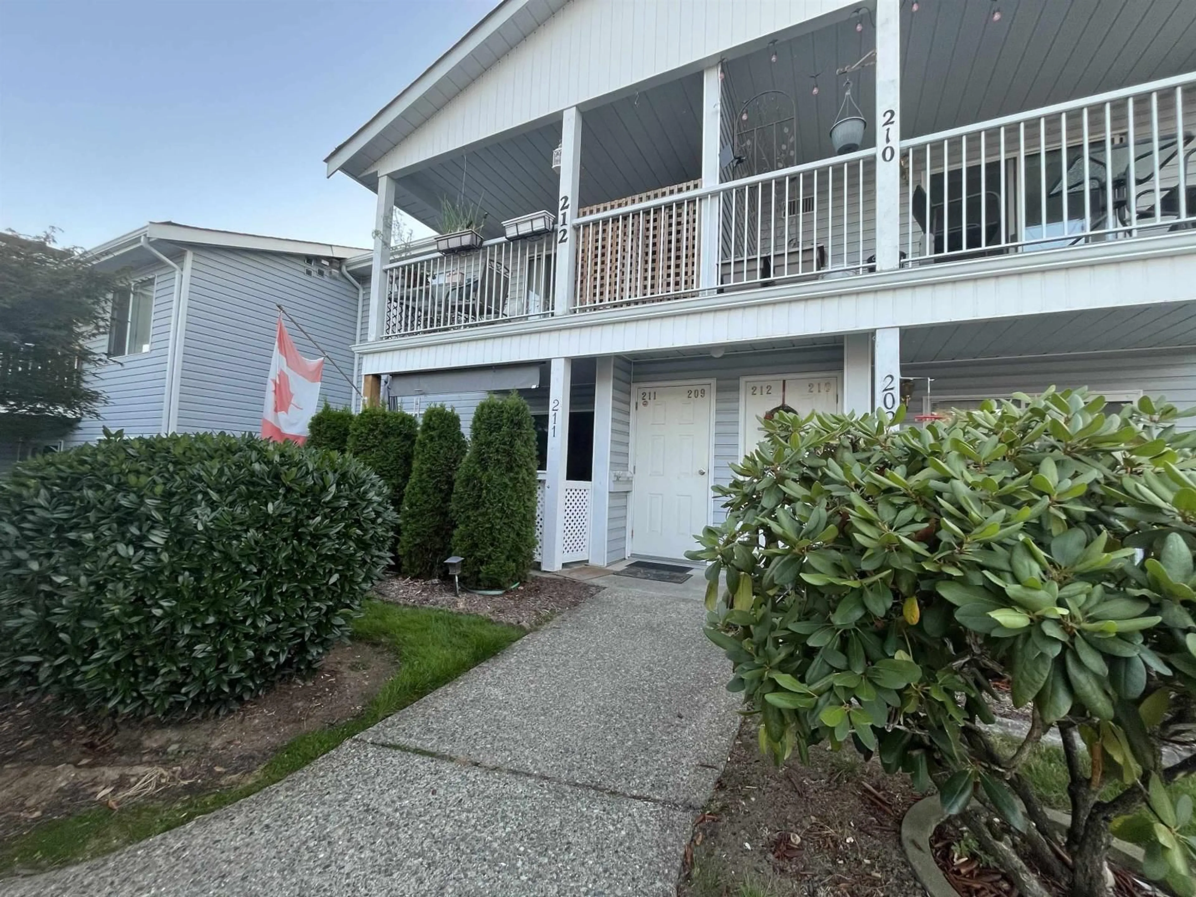 A pic from outside/outdoor area/front of a property/back of a property/a pic from drone, unknown for 211 - 32691 GARIBALDI, Abbotsford British Columbia V2T5T7