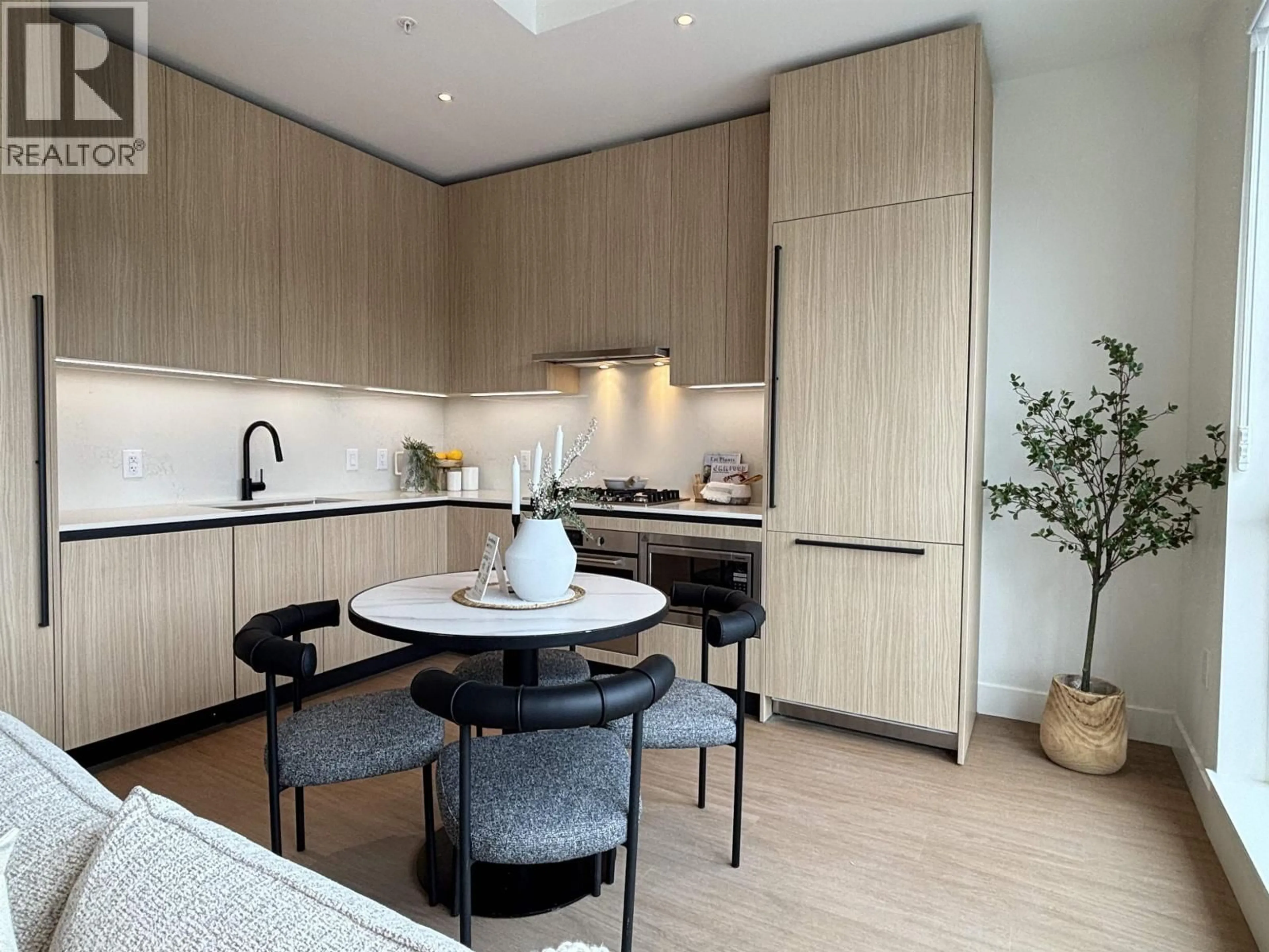 Contemporary kitchen, wood/laminate floor for 601 - 2235 BROADWAY, Vancouver British Columbia V5N0J5