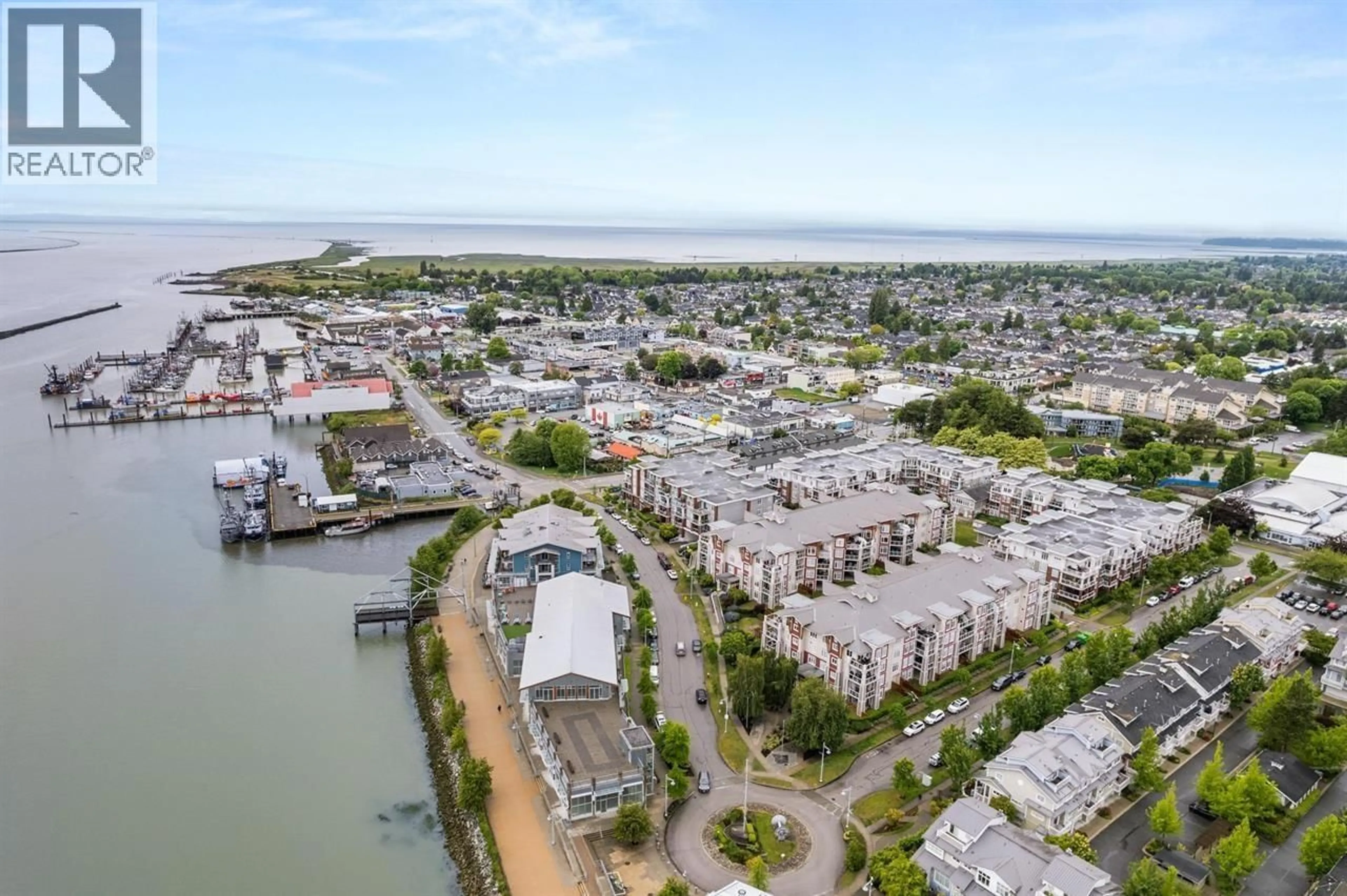 A pic from outside/outdoor area/front of a property/back of a property/a pic from drone, water/lake/river/ocean view for 210 - 4280 MONCTON STREET, Richmond British Columbia V7E6T4