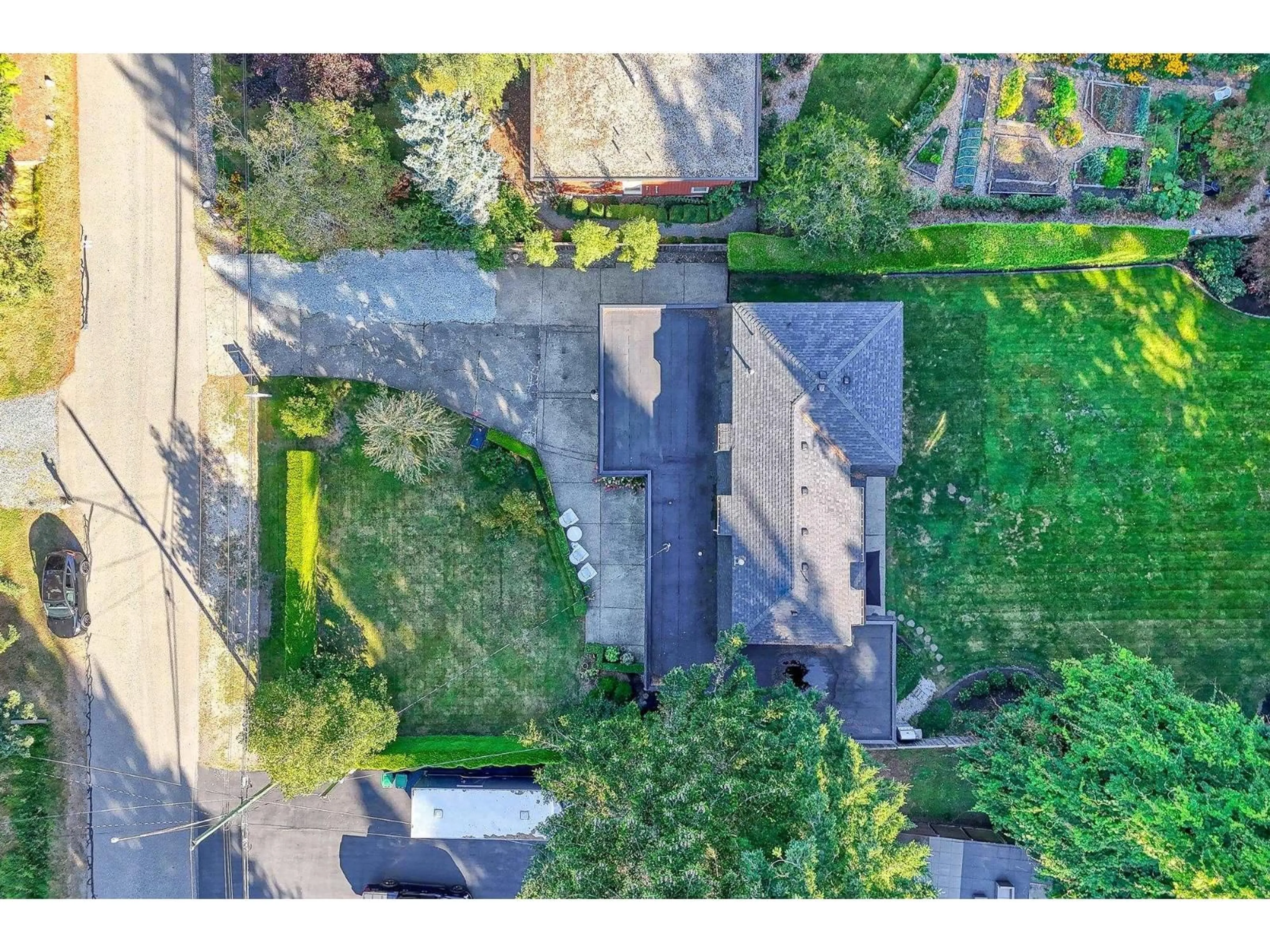 A pic from outside/outdoor area/front of a property/back of a property/a pic from drone, street for 12688 23, Surrey British Columbia V4A2C7