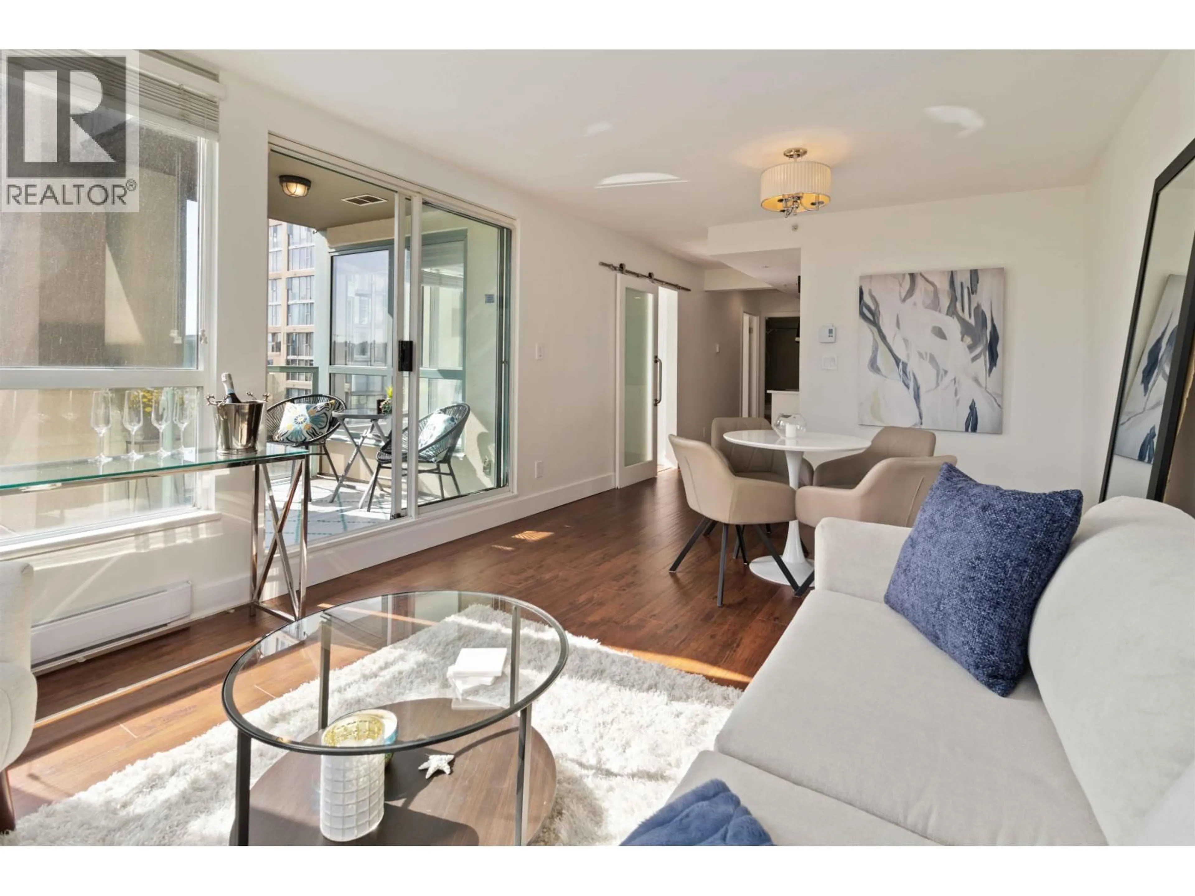 Living room with furniture, wood/laminate floor for 1003 - 907 BEACH AVENUE, Vancouver British Columbia V6Z2R3