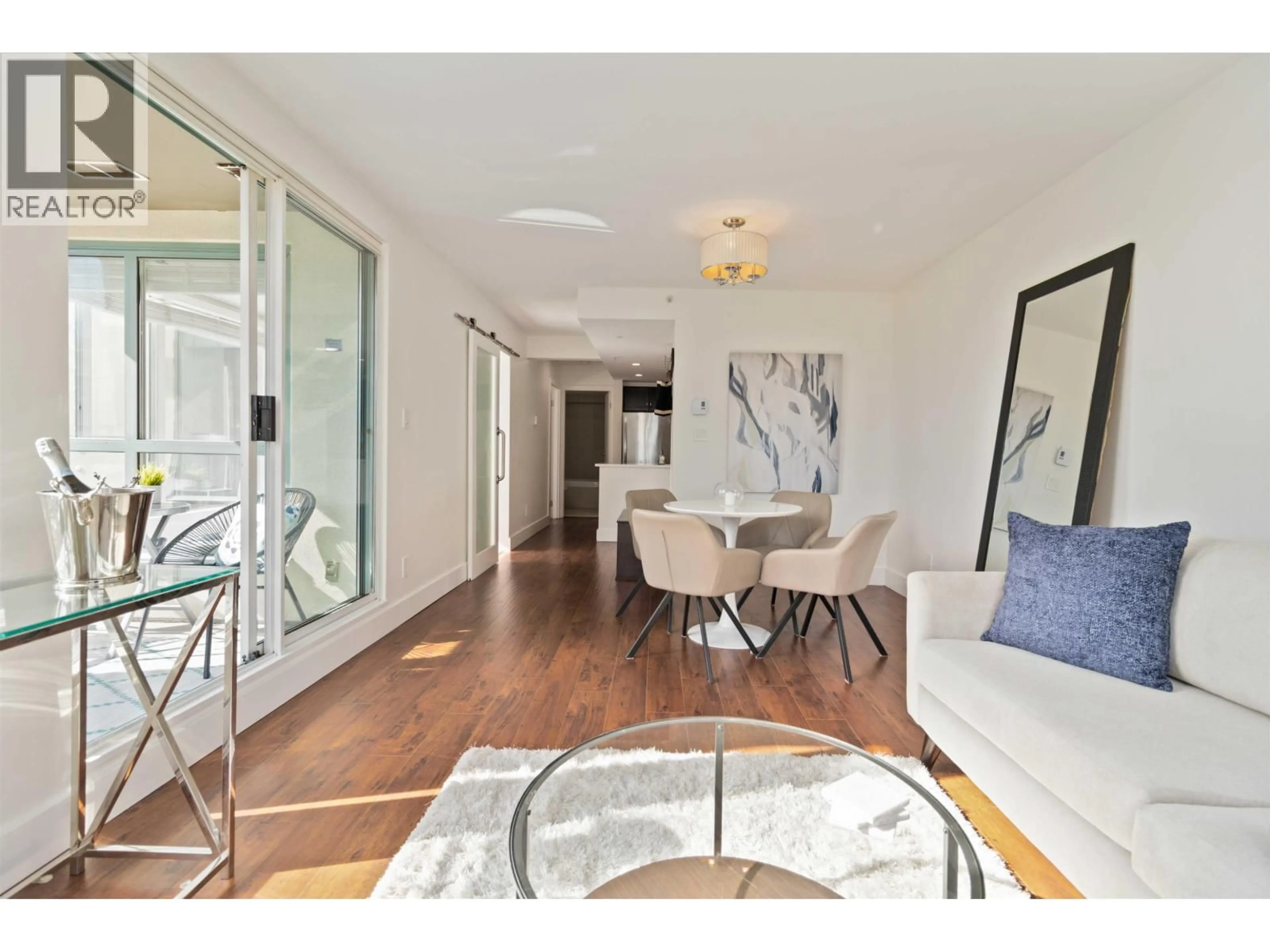 Living room with furniture, wood/laminate floor for 1003 - 907 BEACH AVENUE, Vancouver British Columbia V6Z2R3