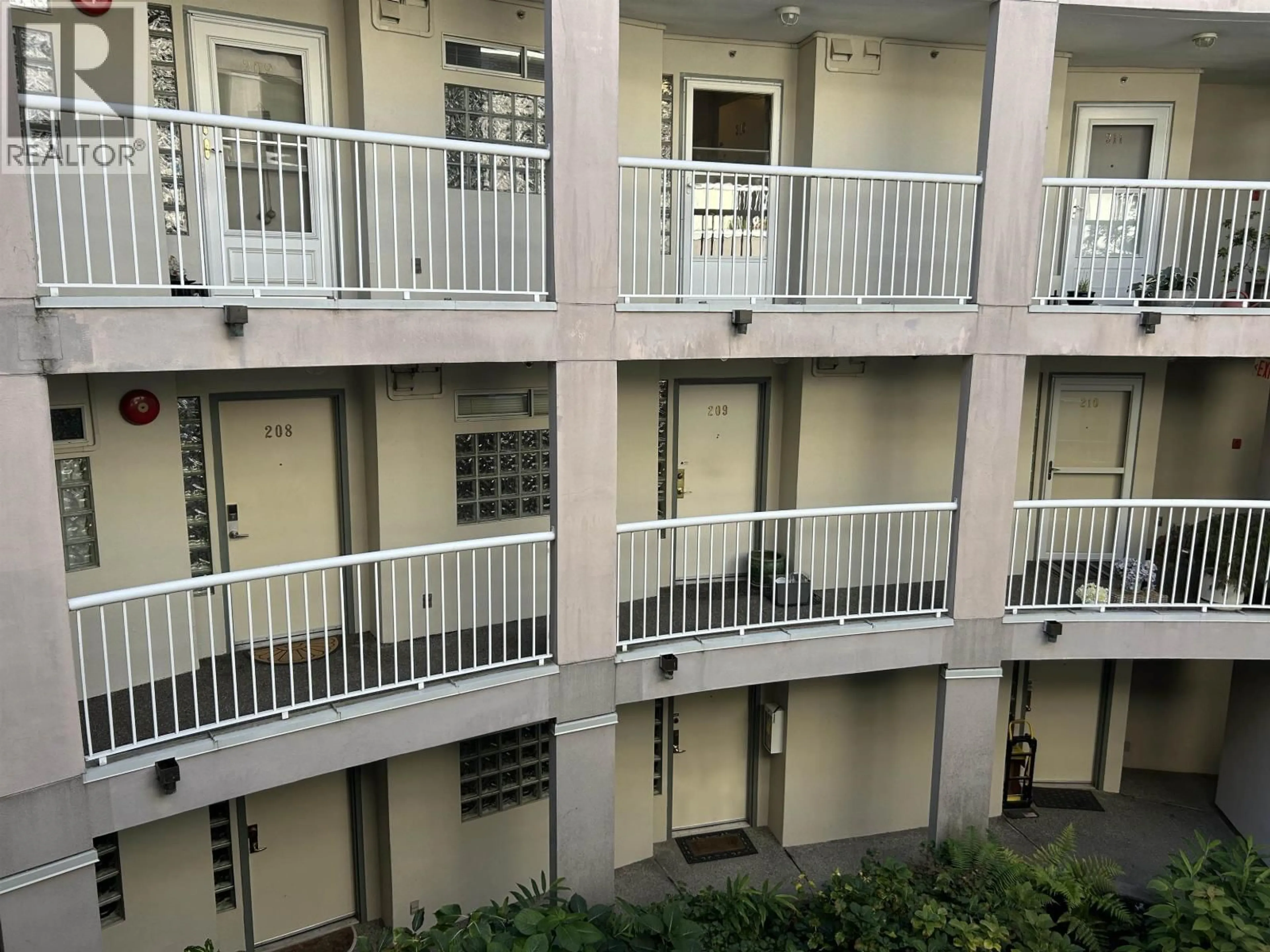Balcony in the apartment, city buildings view from balcony for 209 - 1705 NELSON STREET, Vancouver British Columbia V6G1M6