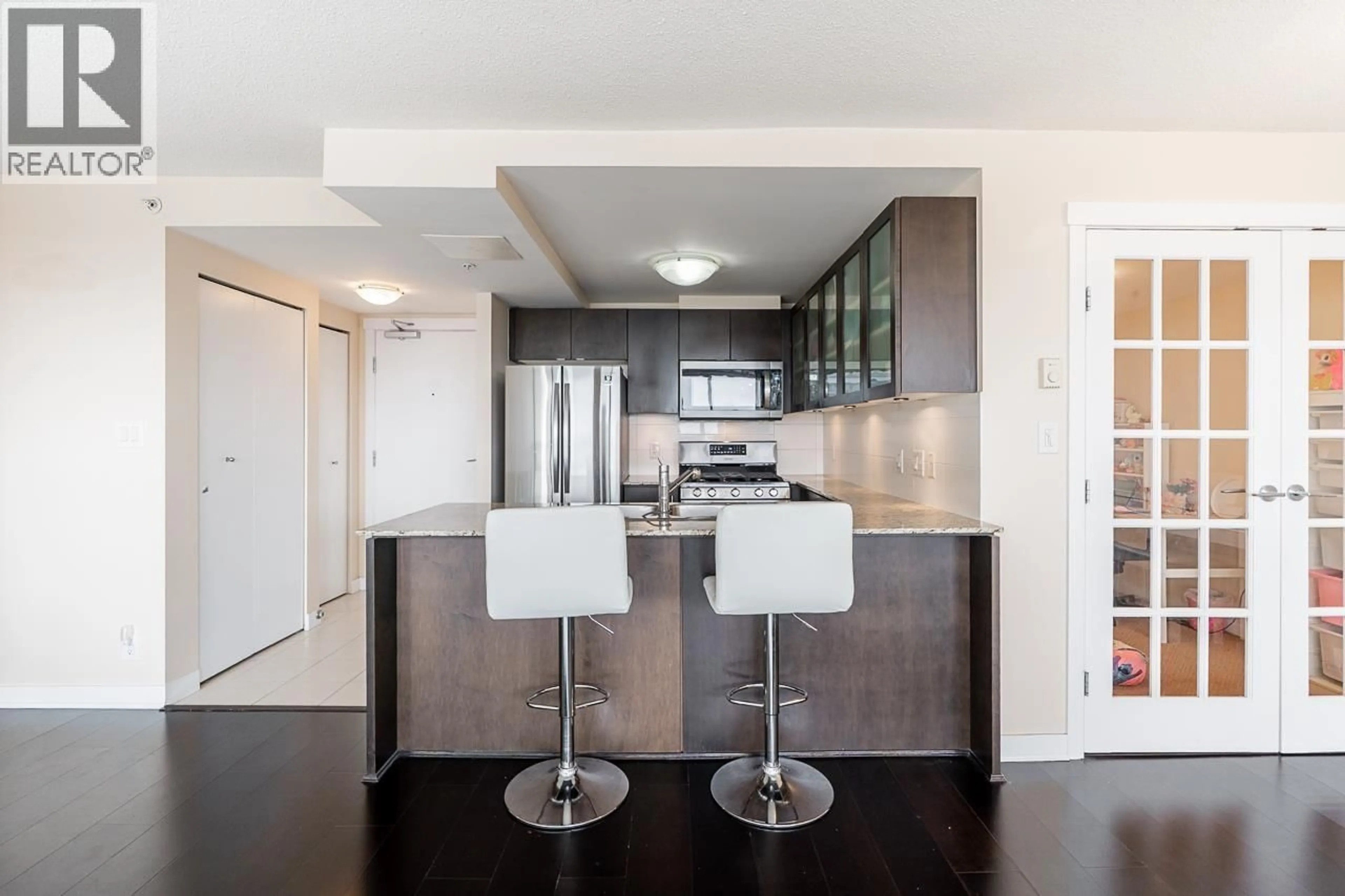 Open concept kitchen, unknown for 1602 - 7555 ALDERBRIDGE WAY, Richmond British Columbia V6X4L3