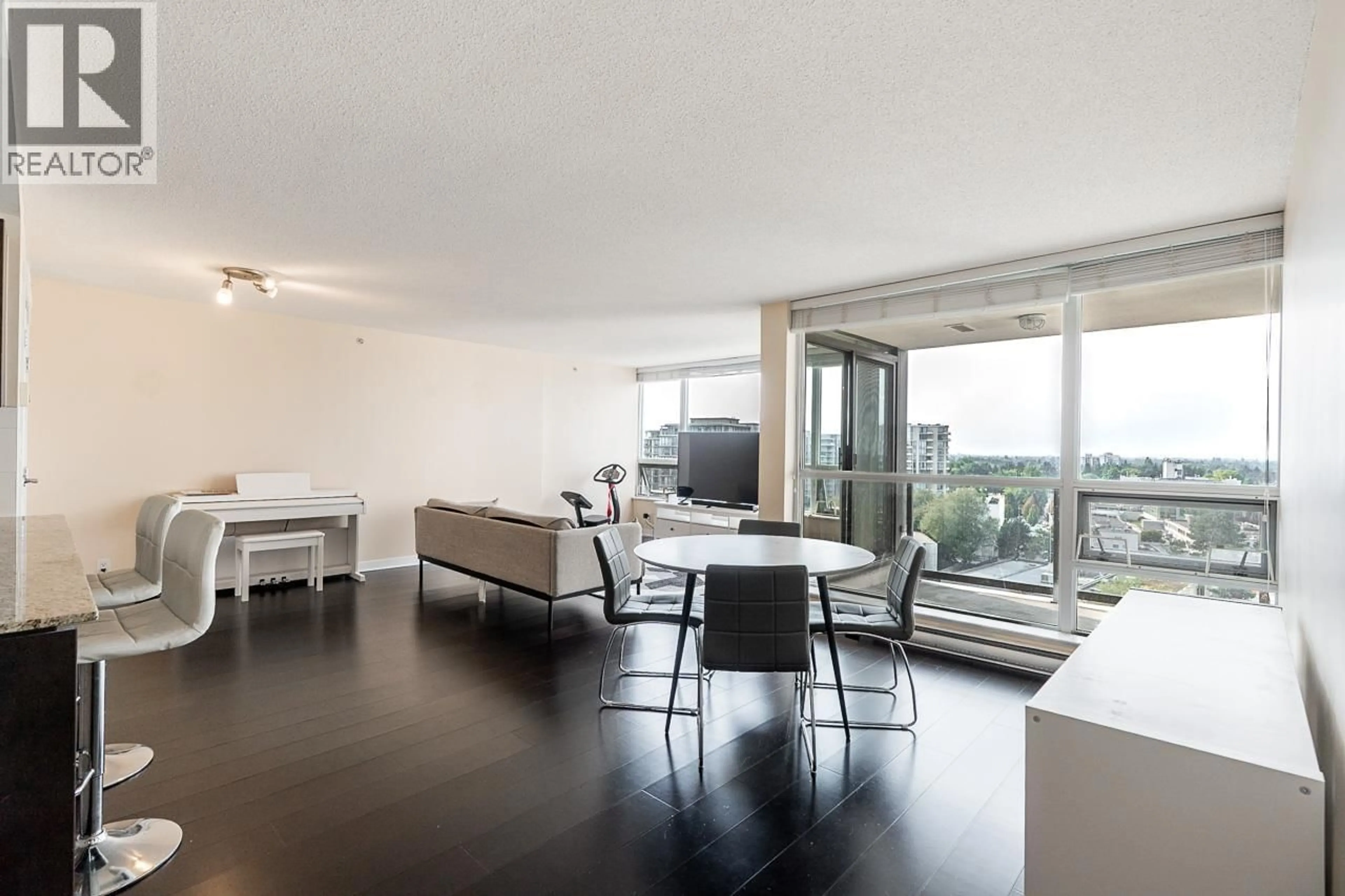 Living room with furniture, wood/laminate floor for 1602 - 7555 ALDERBRIDGE WAY, Richmond British Columbia V6X4L3