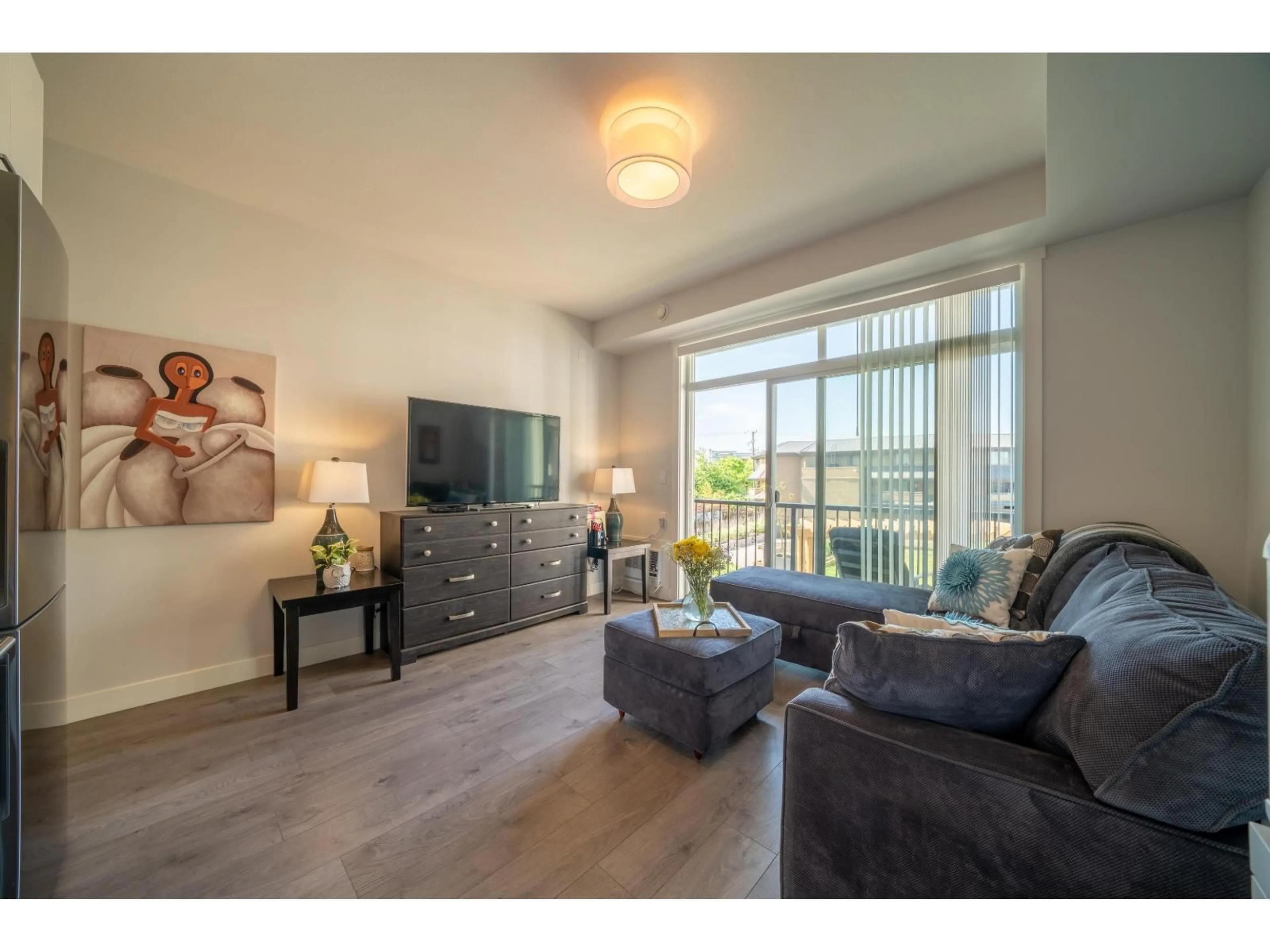 Living room with furniture, wood/laminate floor for 206 - 20686 EASTLEIGH, Langley British Columbia V3A0M4