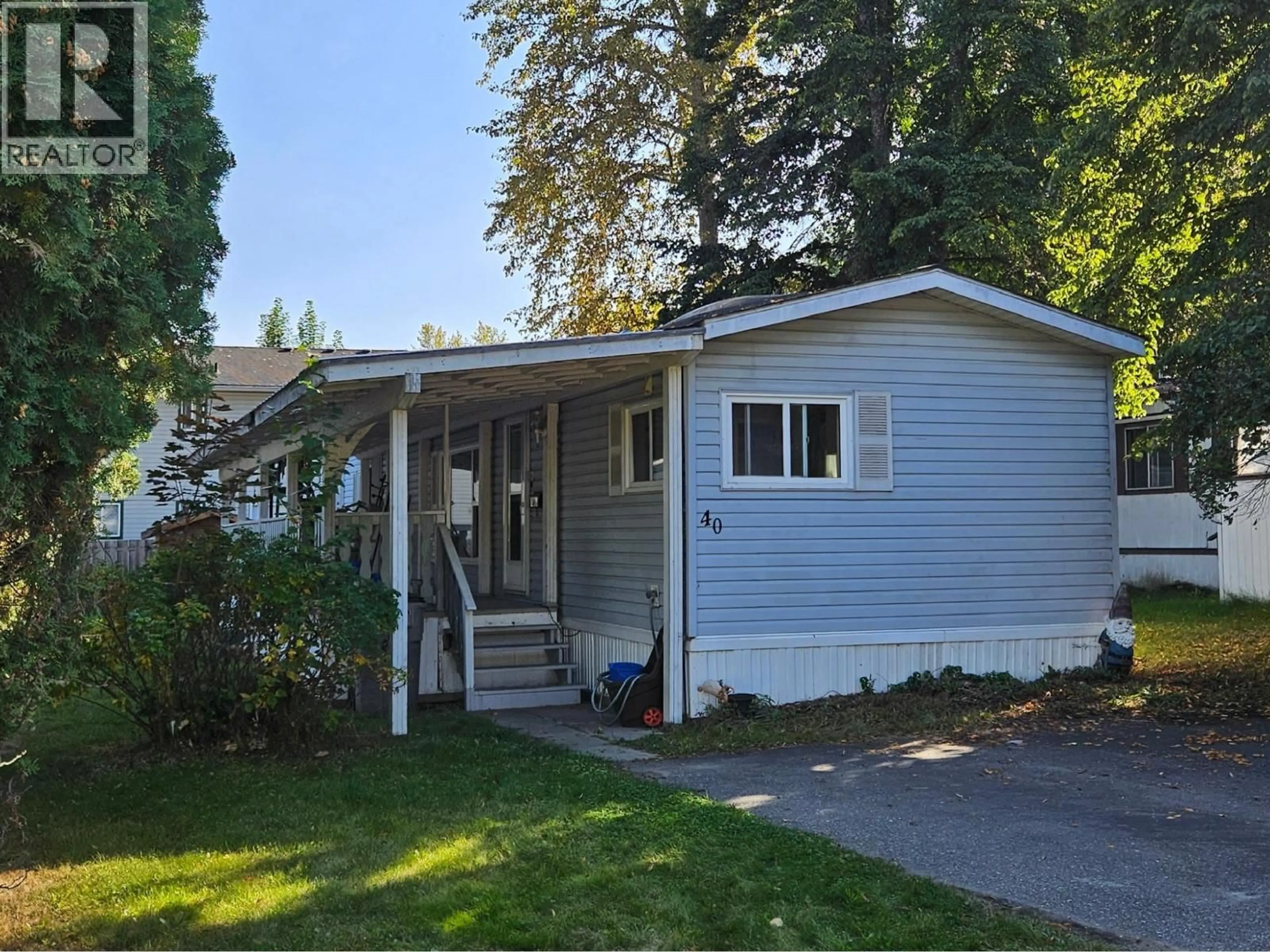 Home with vinyl exterior material, street for 40 - 654 NORTH FRASER DRIVE, Quesnel British Columbia V2J1Z6