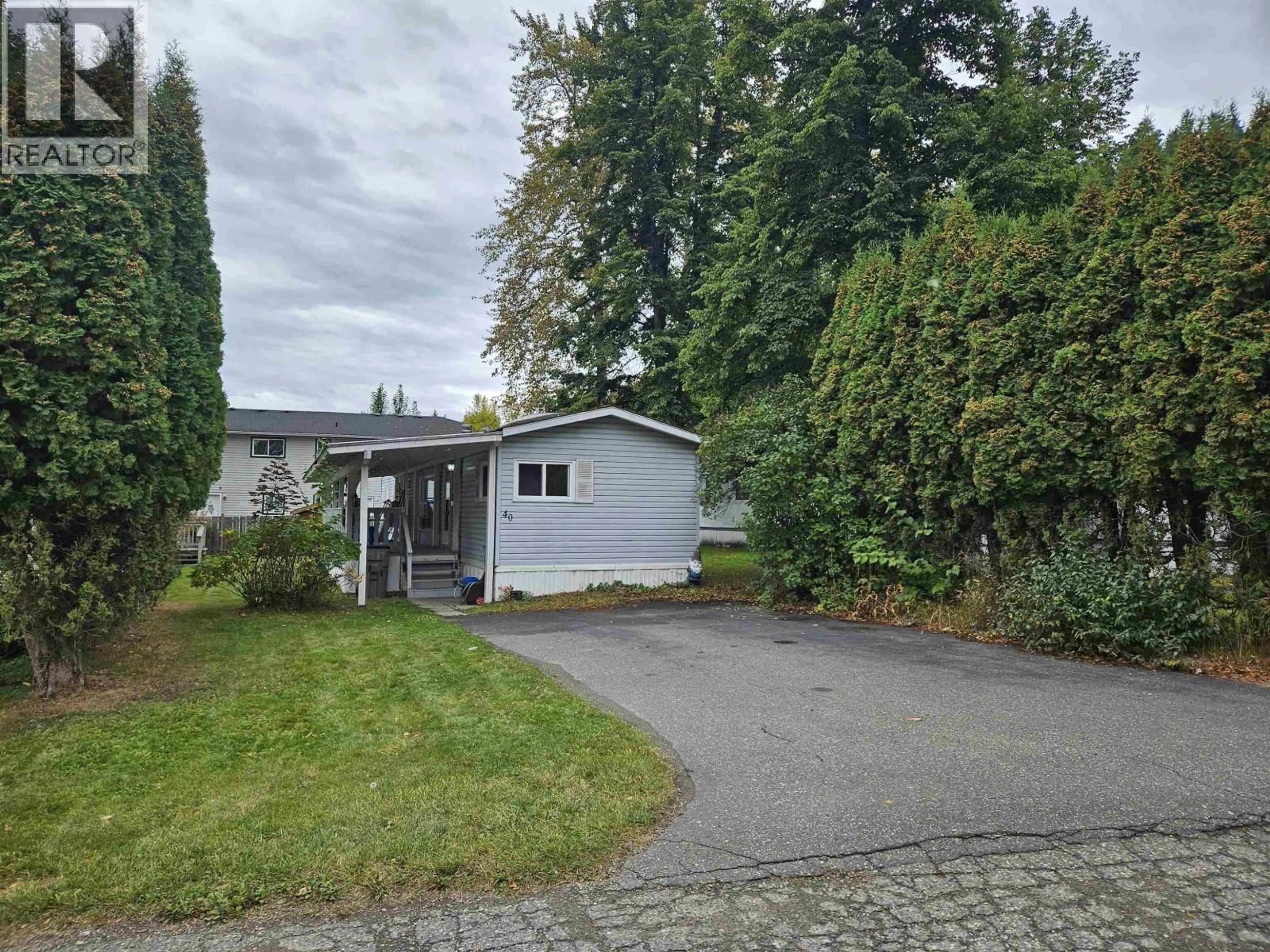 A pic from outside/outdoor area/front of a property/back of a property/a pic from drone, street for 40 - 654 NORTH FRASER DRIVE, Quesnel British Columbia V2J1Z6