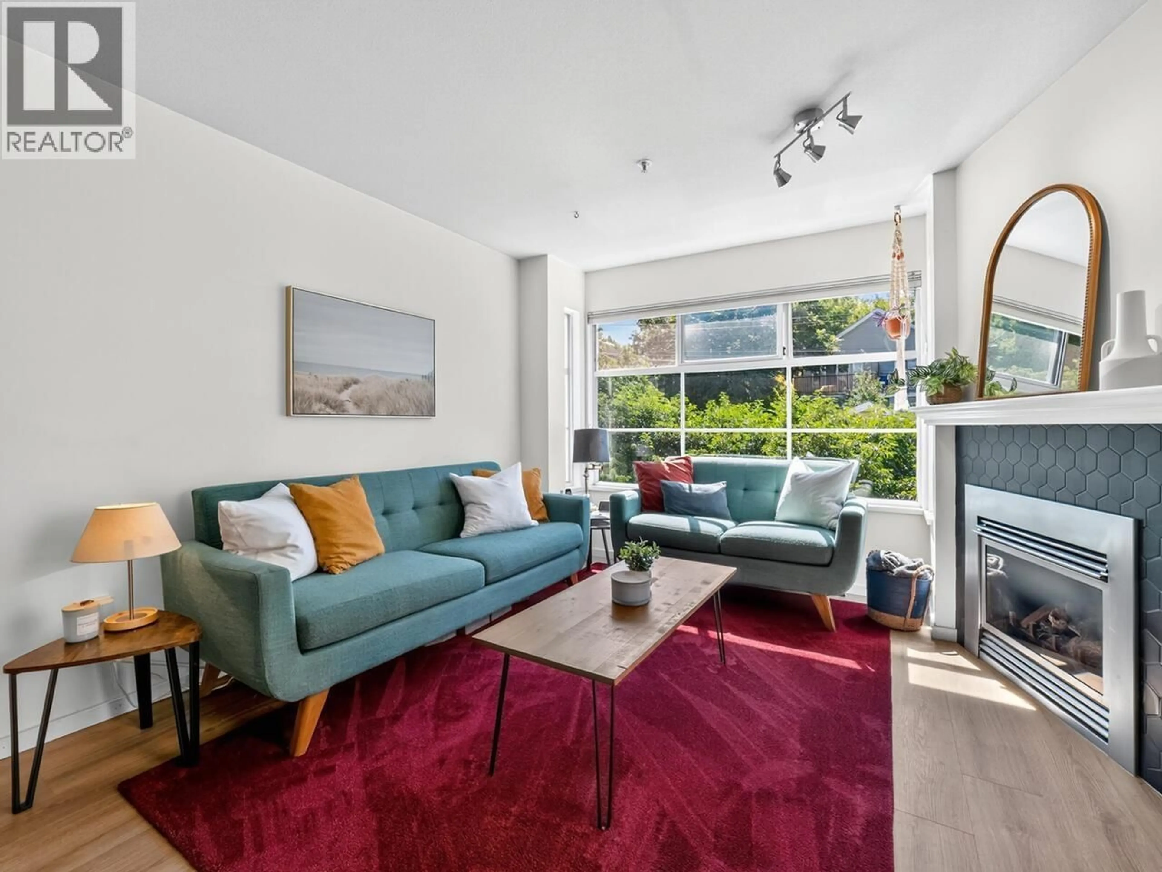 Living room with furniture, unknown for 302 - 2388 TRIUMPH STREET, Vancouver British Columbia V5L1L5