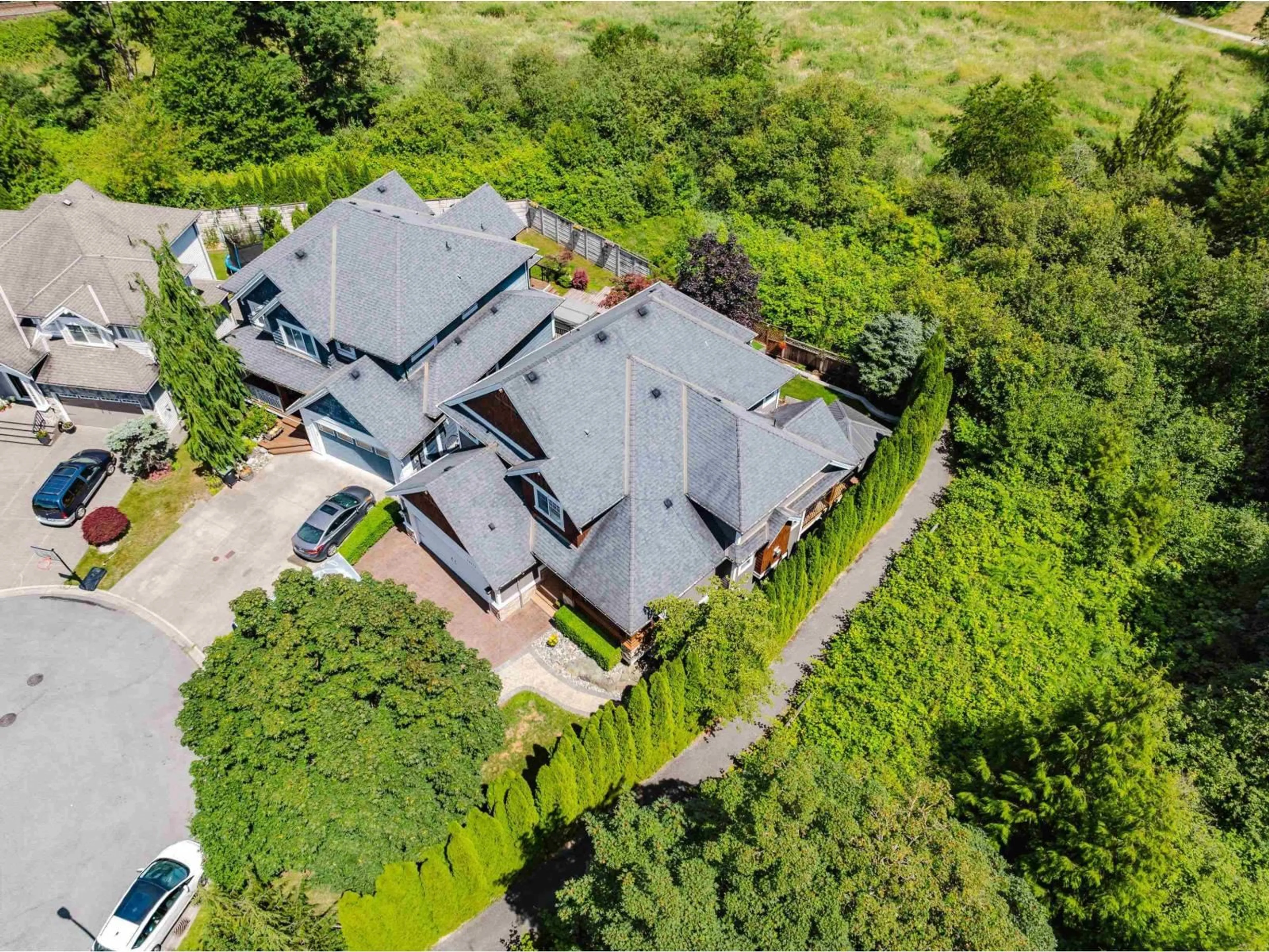 A pic from outside/outdoor area/front of a property/back of a property/a pic from drone, unknown for 20472 98A, Langley British Columbia V1M0A6