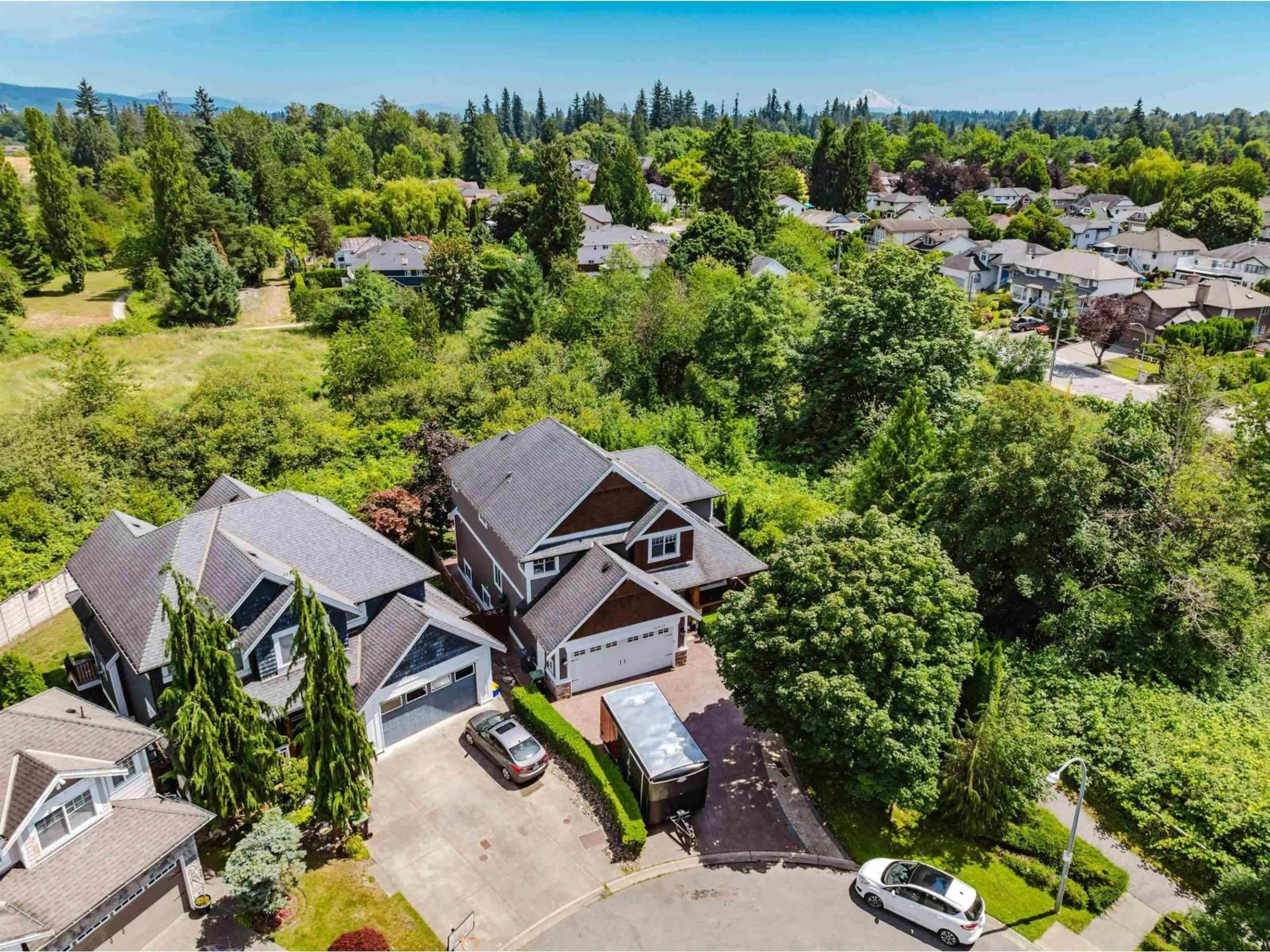 A pic from outside/outdoor area/front of a property/back of a property/a pic from drone, street for 20472 98A, Langley British Columbia V1M0A6