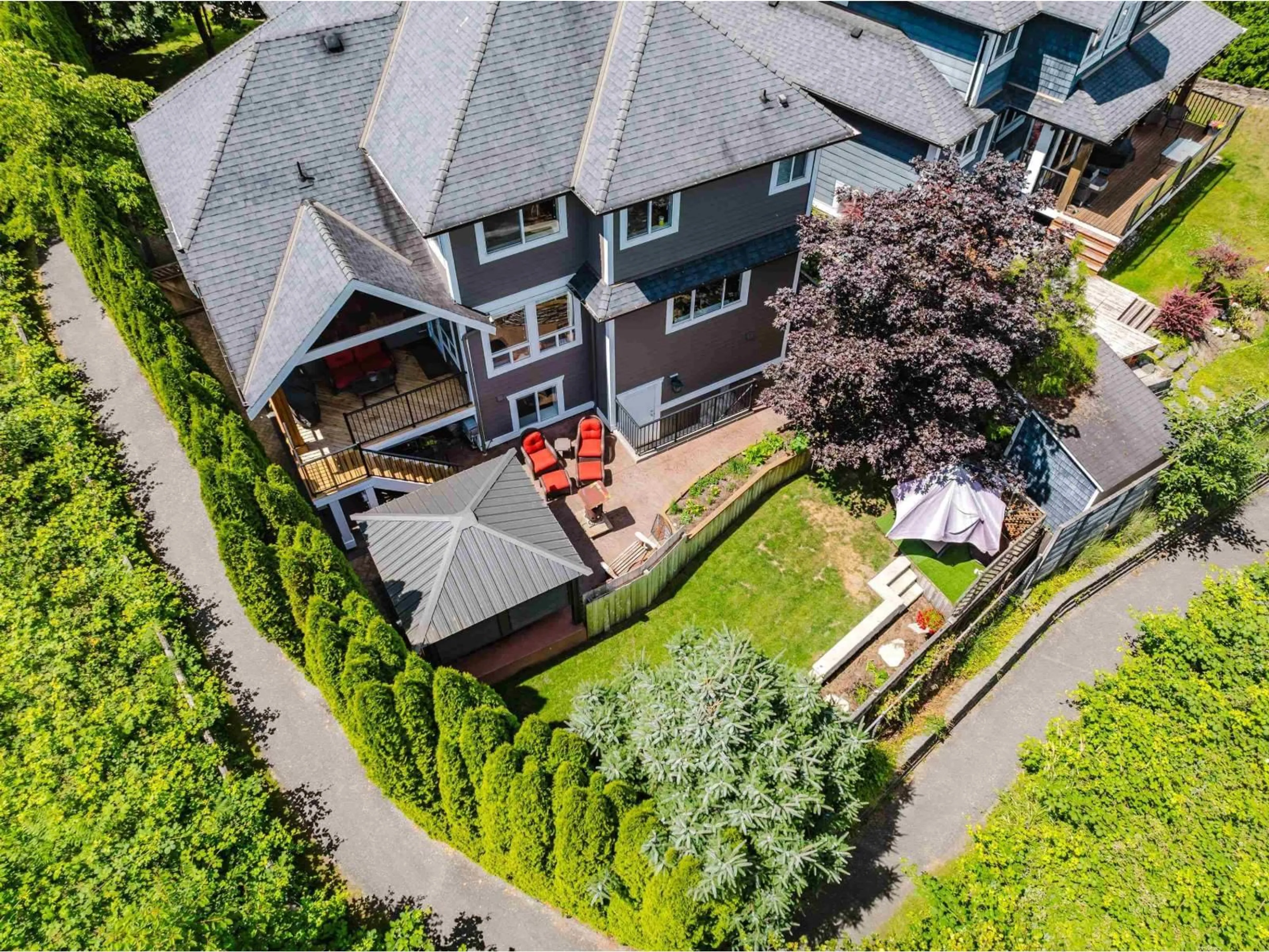 A pic from outside/outdoor area/front of a property/back of a property/a pic from drone, street for 20472 98A, Langley British Columbia V1M0A6