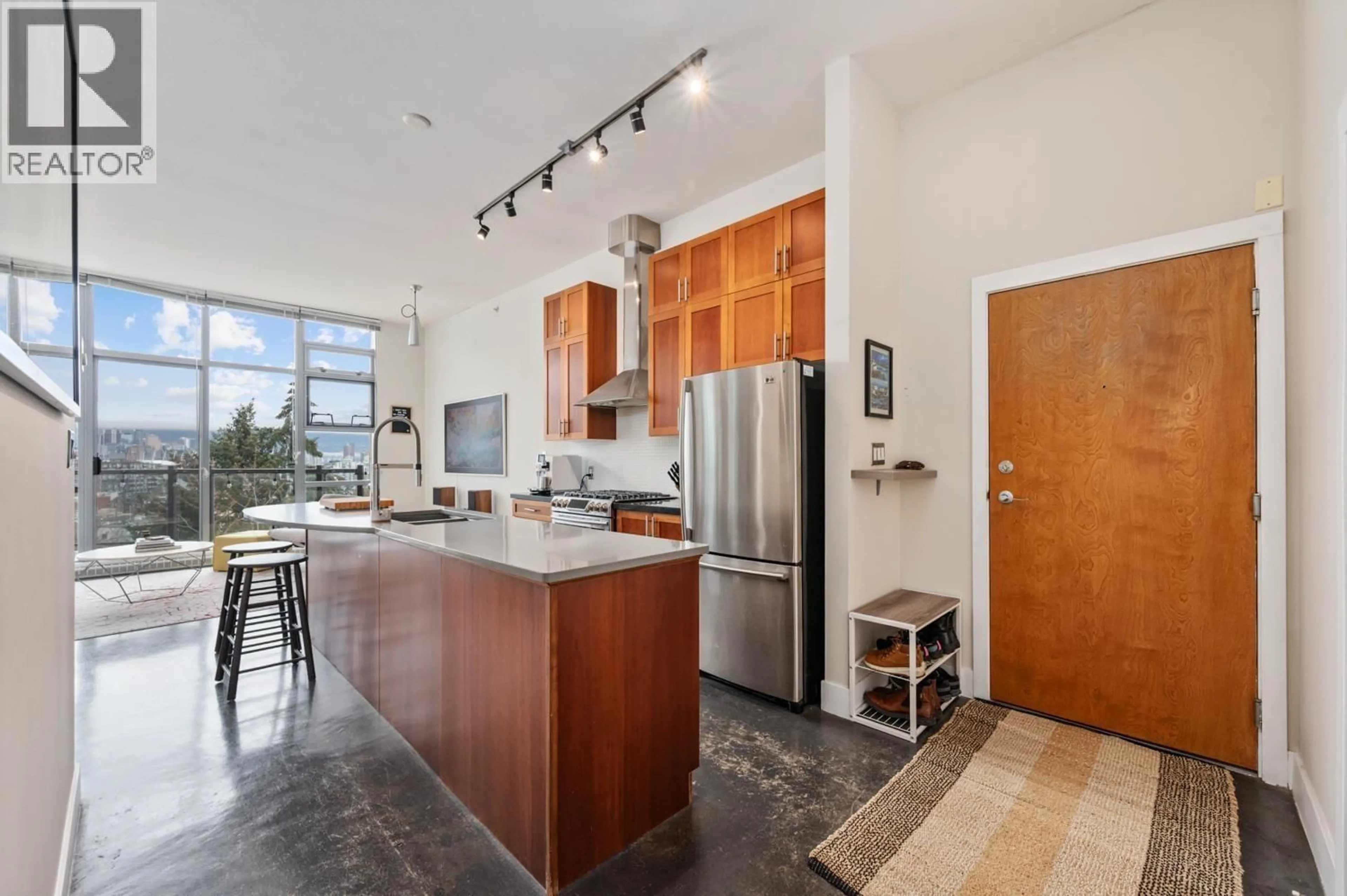 Open concept kitchen, ceramic/tile floor for 606 - 2635 PRINCE EDWARD STREET, Vancouver British Columbia V5T4V7