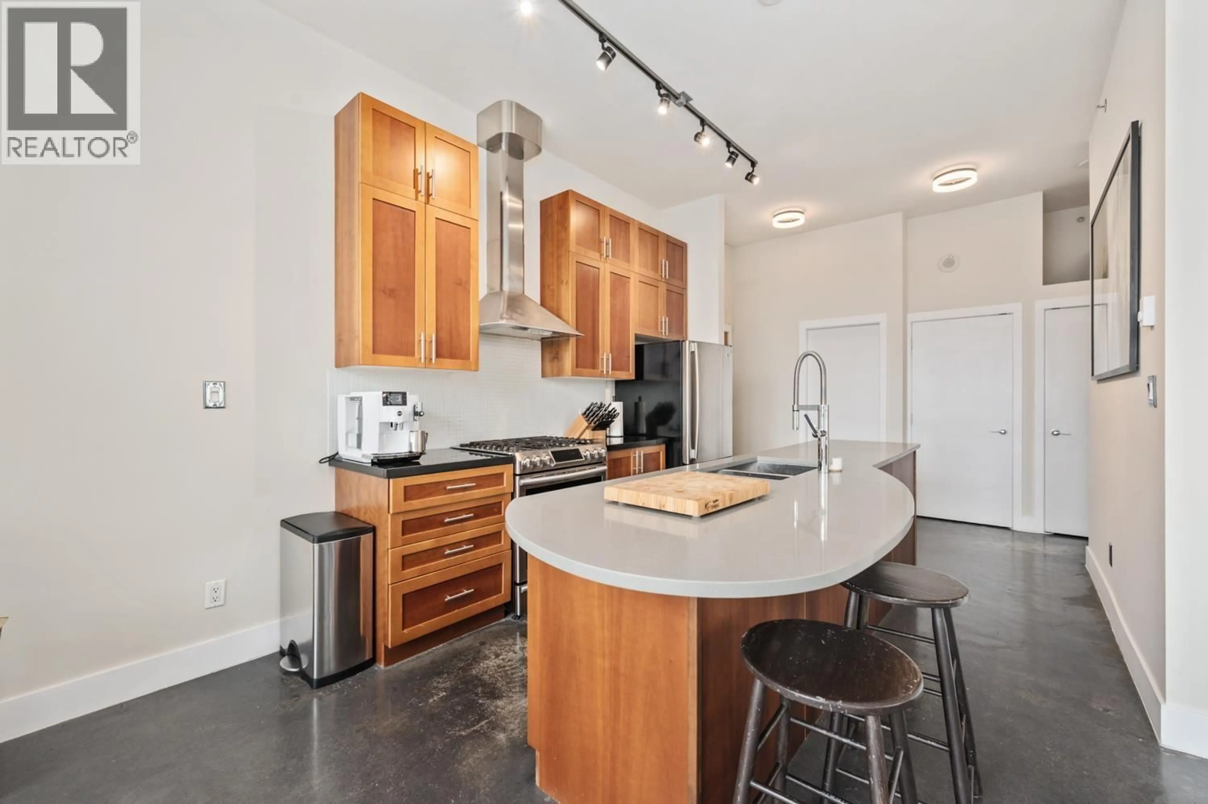 Open concept kitchen, unknown for 606 - 2635 PRINCE EDWARD STREET, Vancouver British Columbia V5T4V7