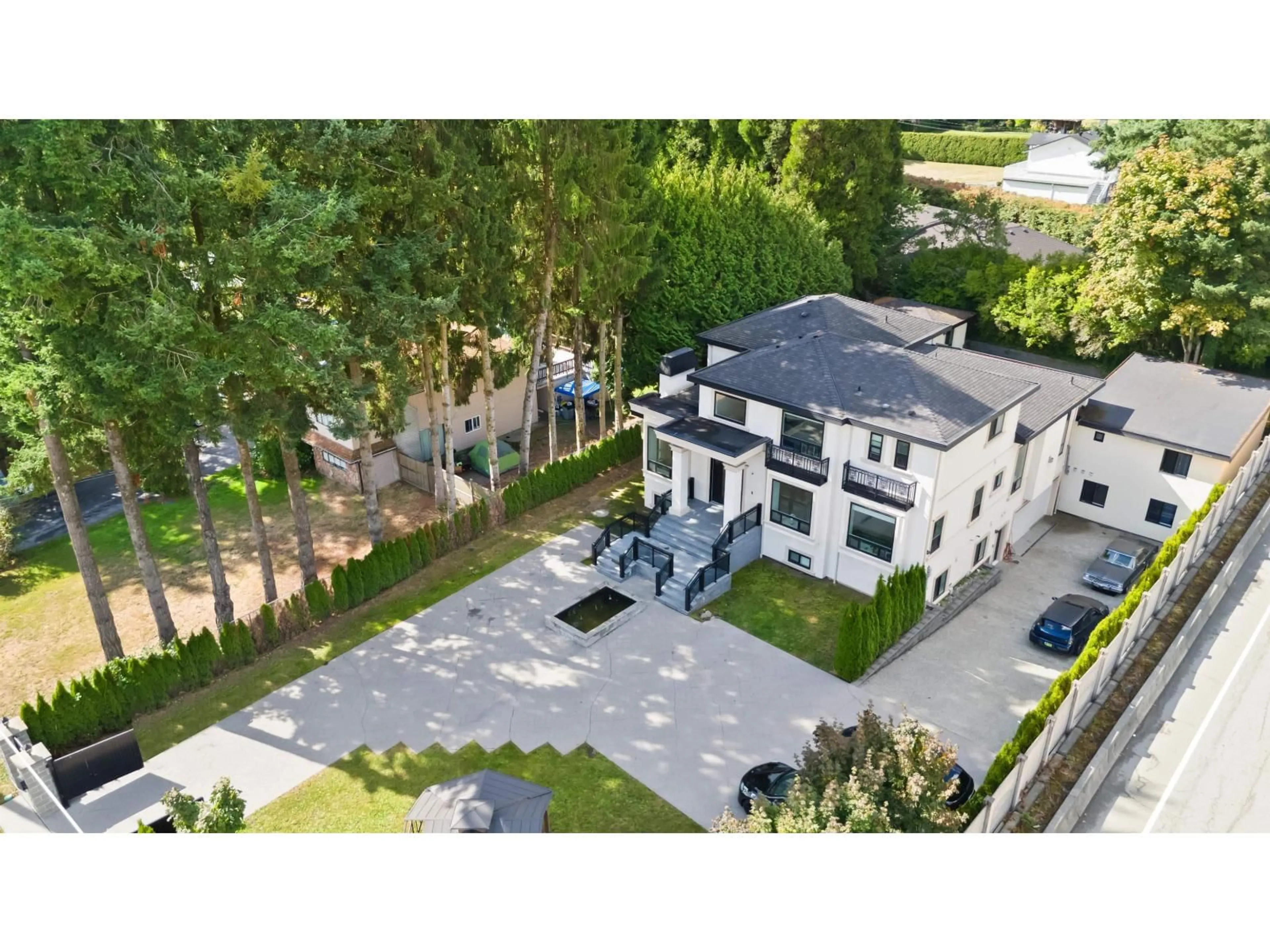 A pic from outside/outdoor area/front of a property/back of a property/a pic from drone, street for 5585 148, Surrey British Columbia V3S3B5