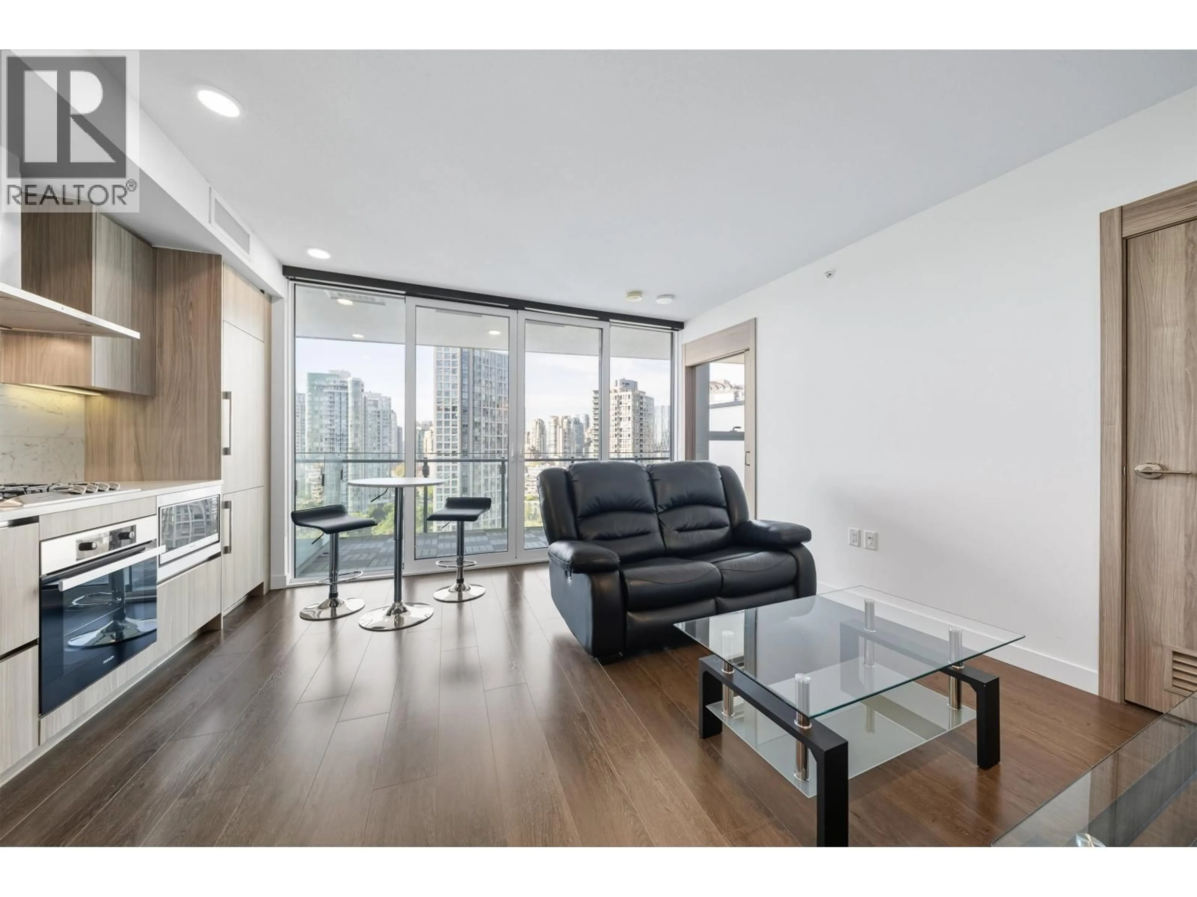 Living room with furniture, wood/laminate floor for 1804 - 89 NELSON STREET, Vancouver British Columbia V6Z0E7