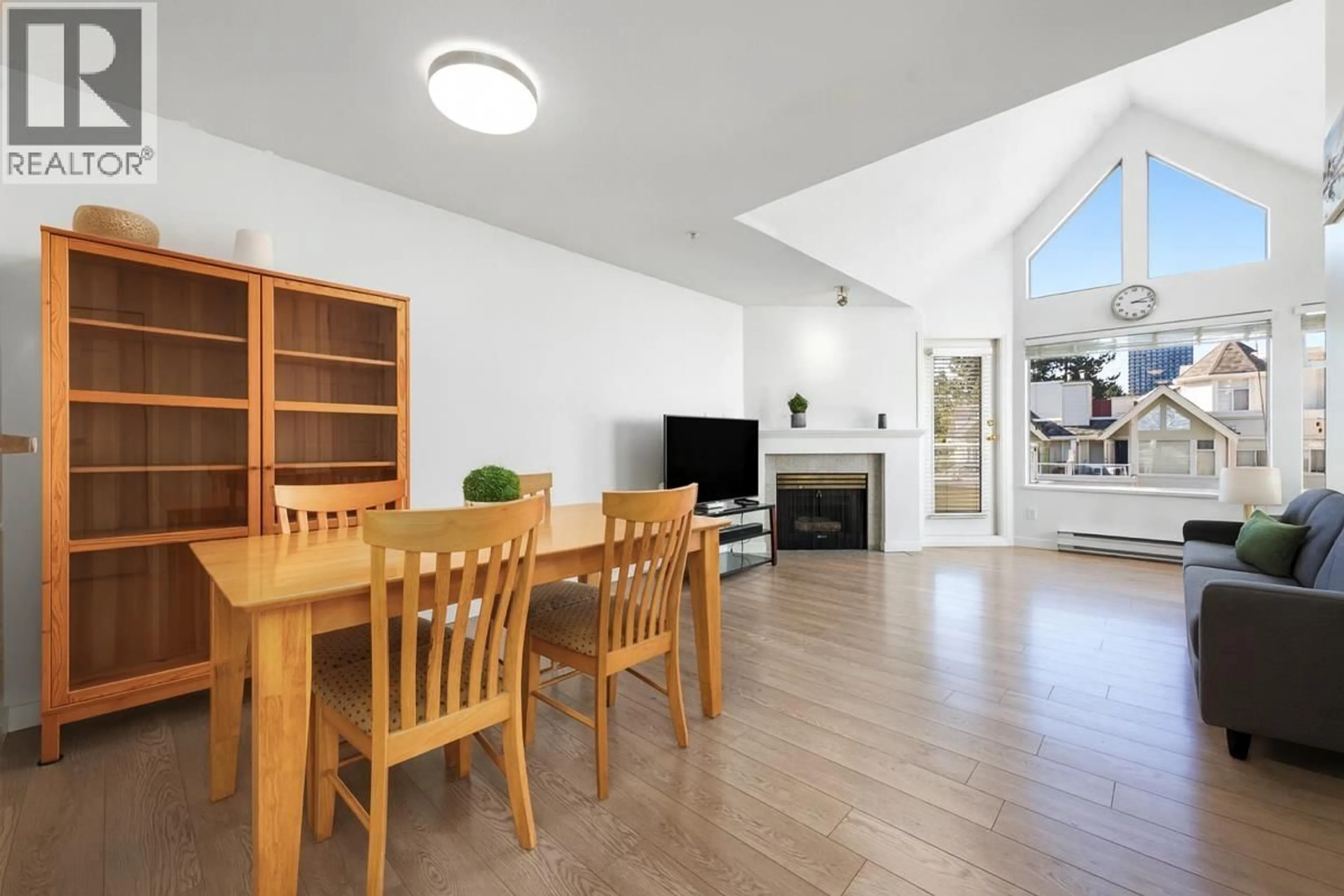 Dining room, wood/laminate floor for 310 - 3638 RAE AVENUE, Vancouver British Columbia V5R2P5