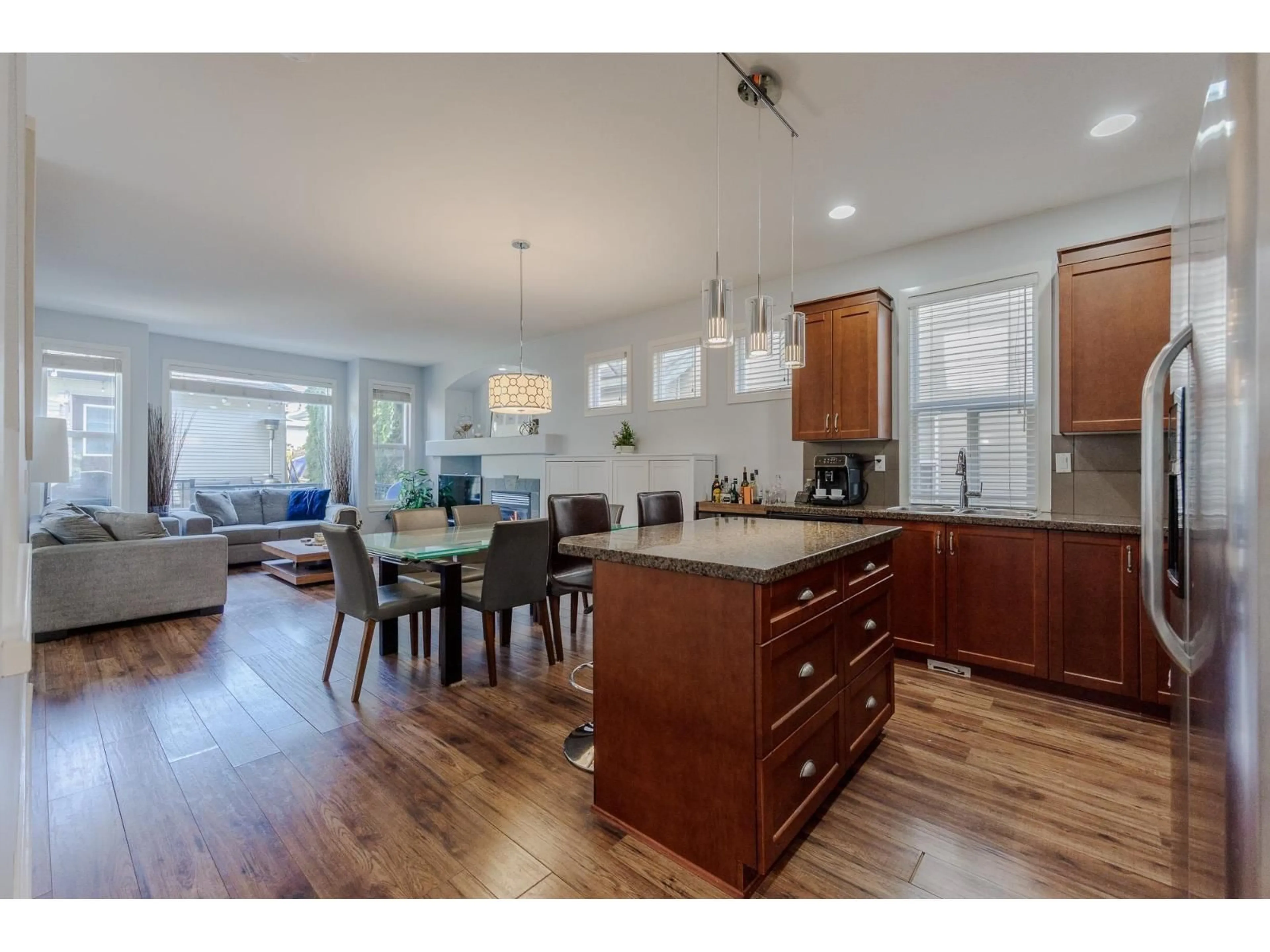 Open concept kitchen, wood/laminate floor for 6942 190TH, Surrey British Columbia V4N5P1